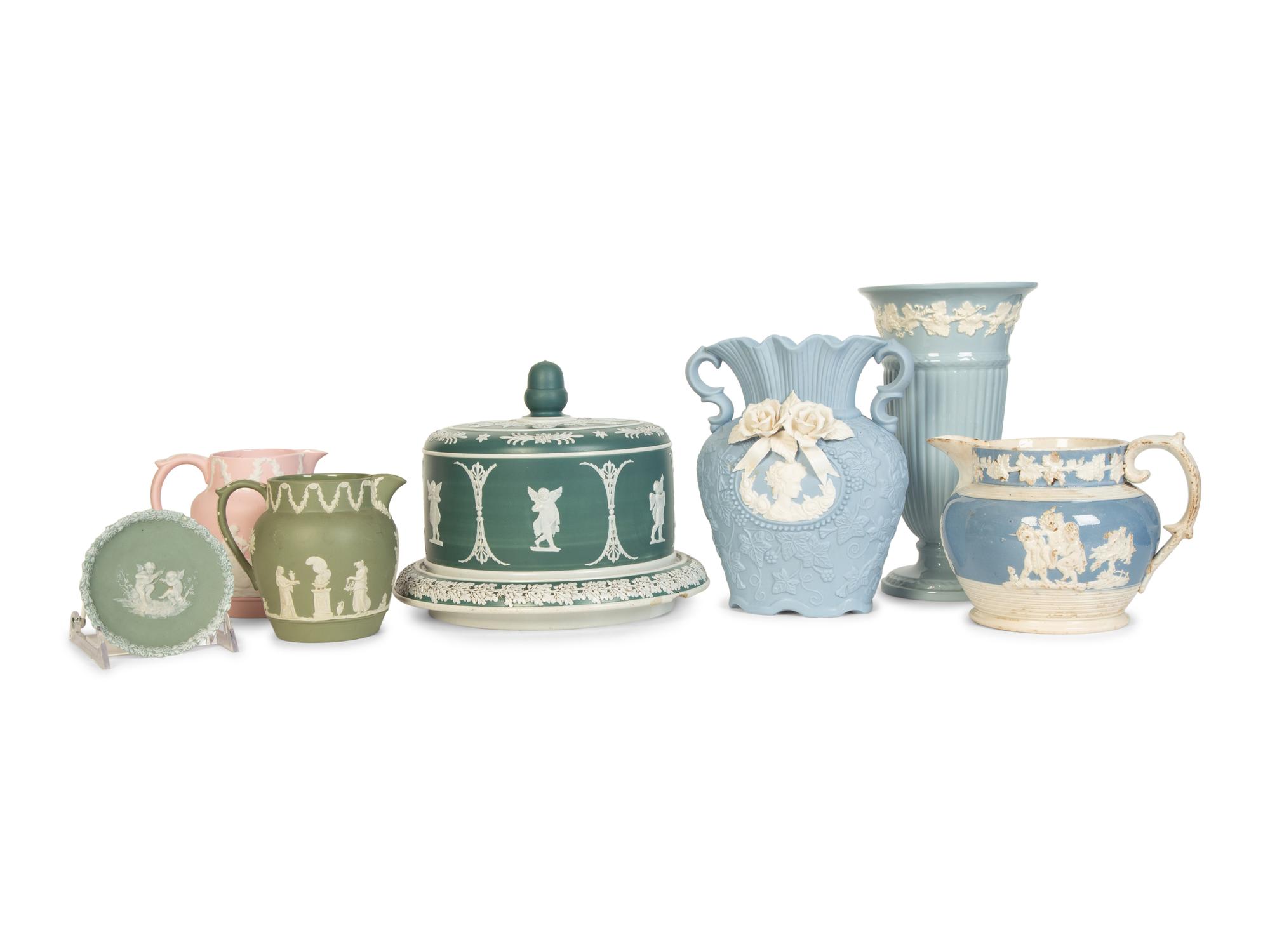 Seven Jasperware Pitchers and Table Articles