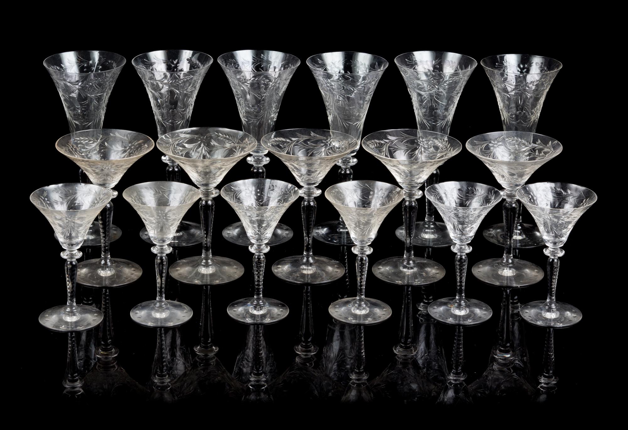 A Set of Etched Glass Stemware Height of tallest 8 1/2 inches.