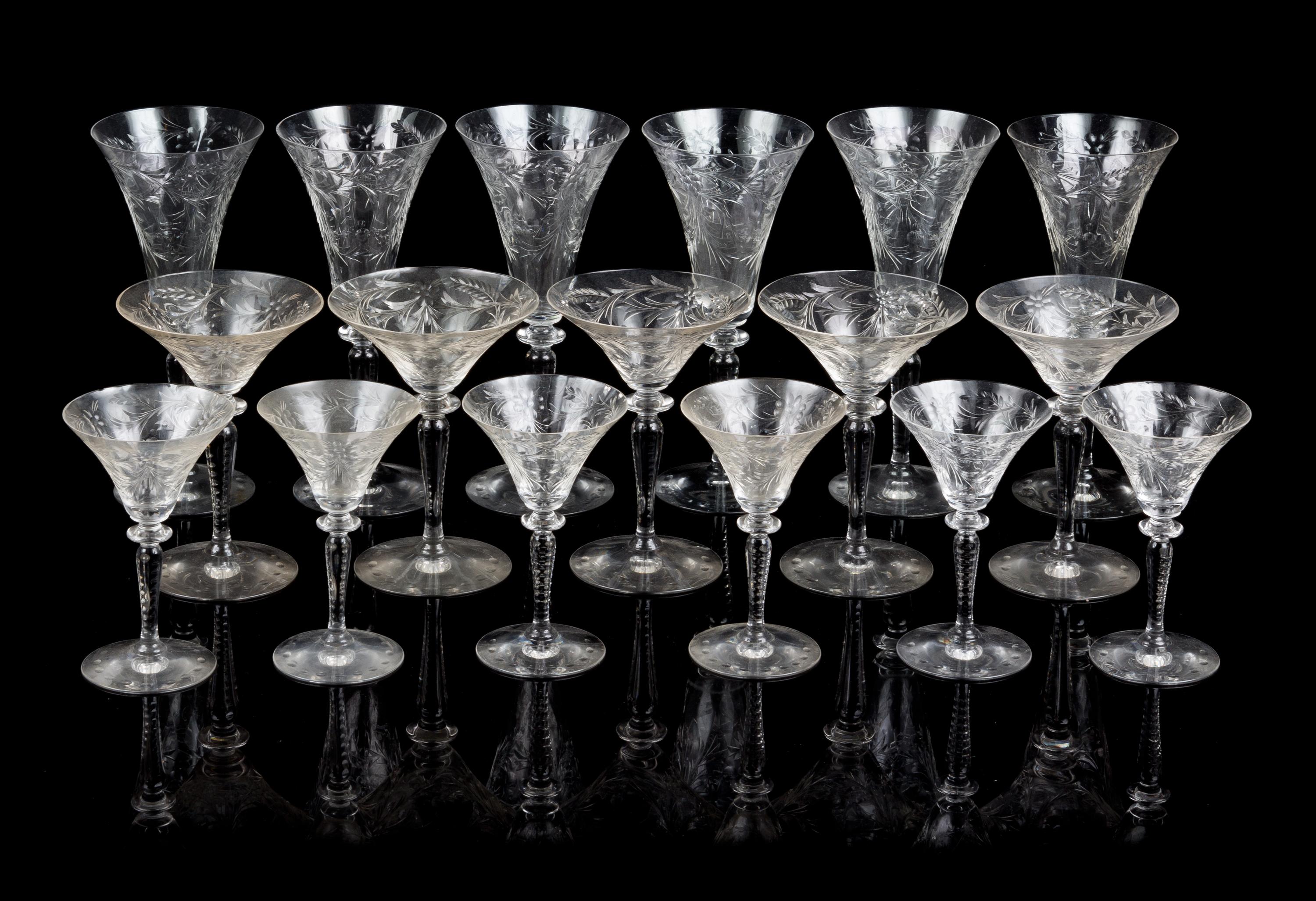 A Set of Etched Glass Stemware Height of tallest 8 1/2 inches.