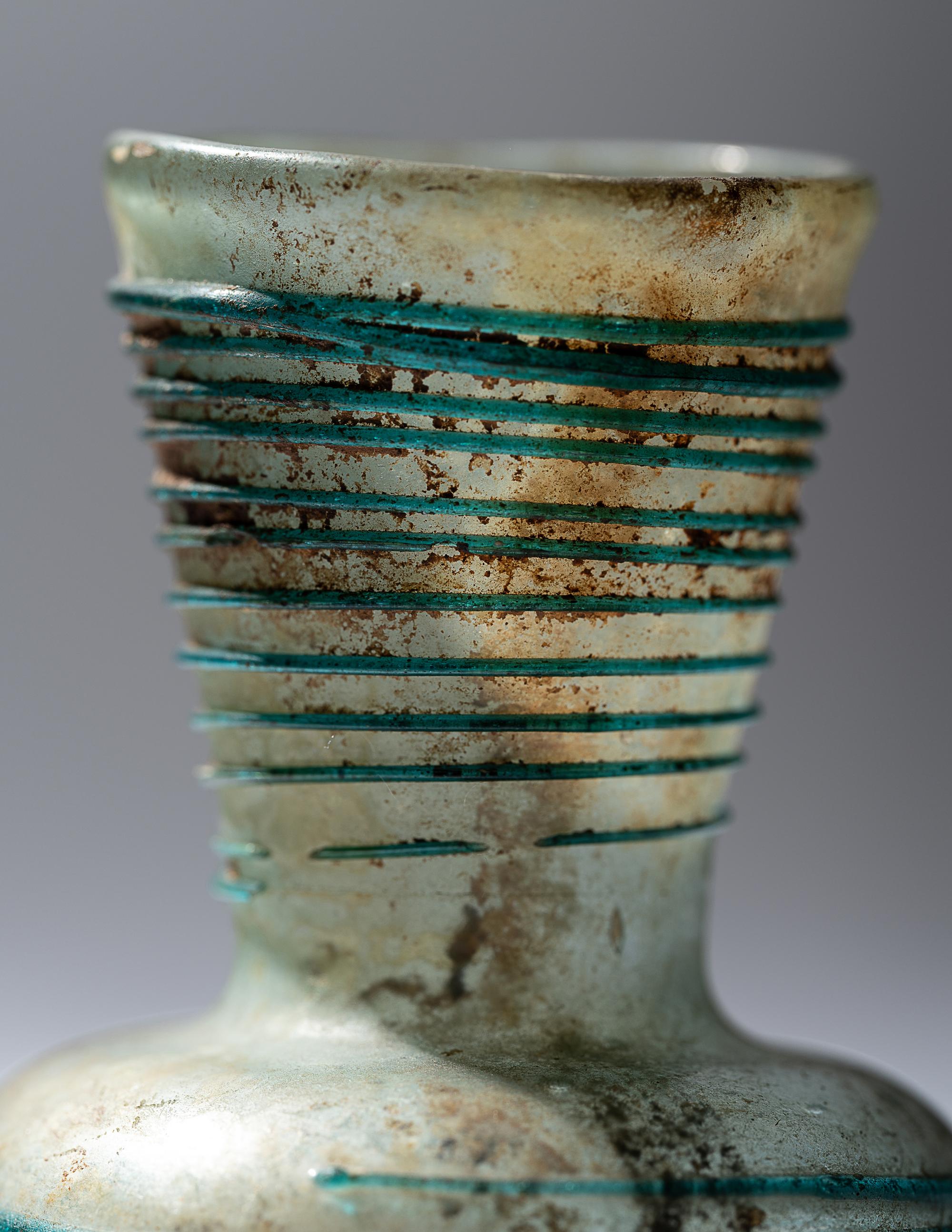 A Roman Pale Blue Glass Bottle