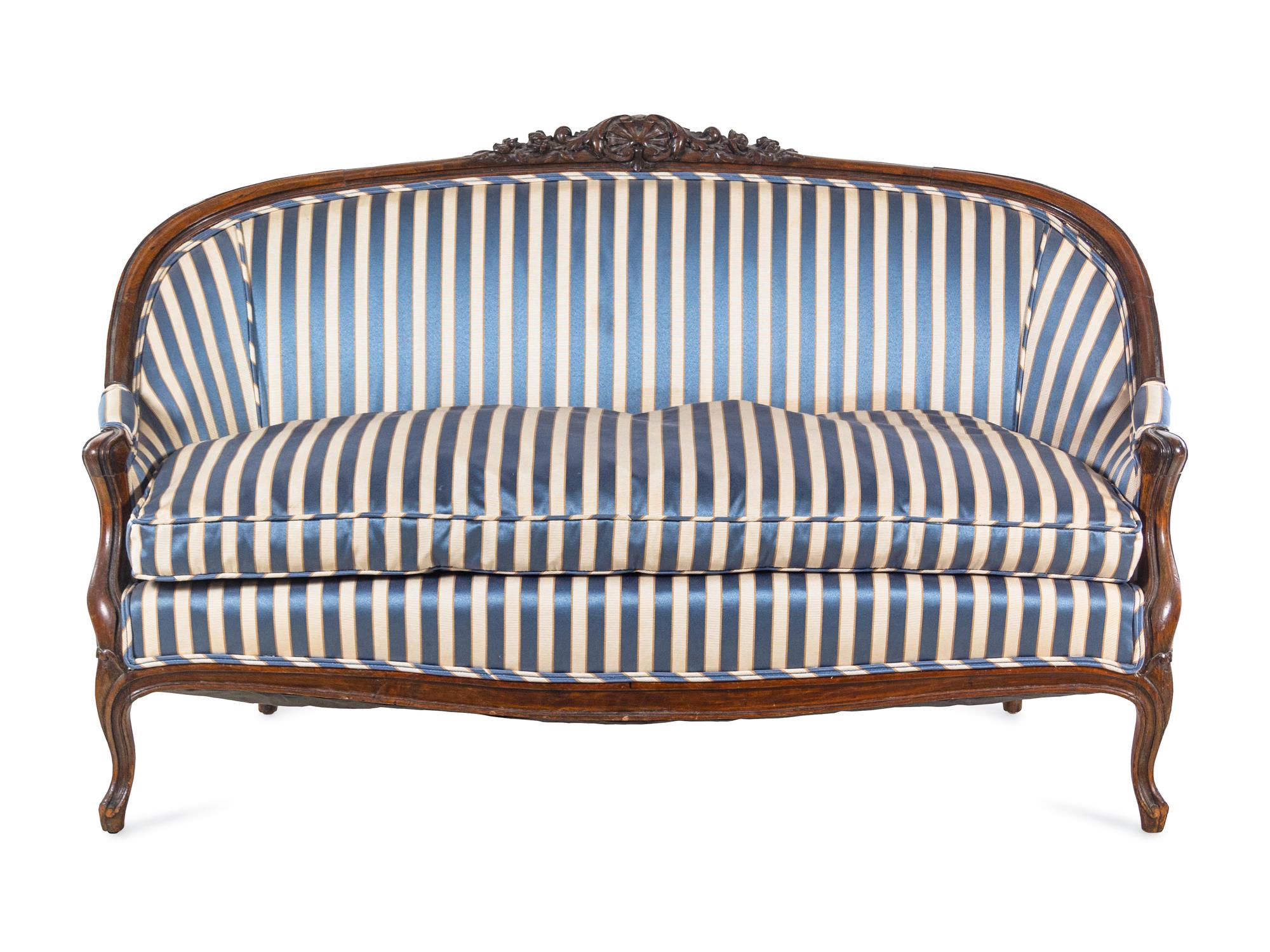 A Louis XV Style Carved Walnut Settee