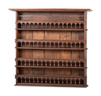 A Continental Brass Mounted Oak Hanging Plate Rack