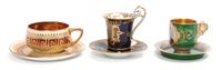 Three Continental Cabinet Cup and Saucer Sets Diameter of largest saucer 5 3/4 inches.