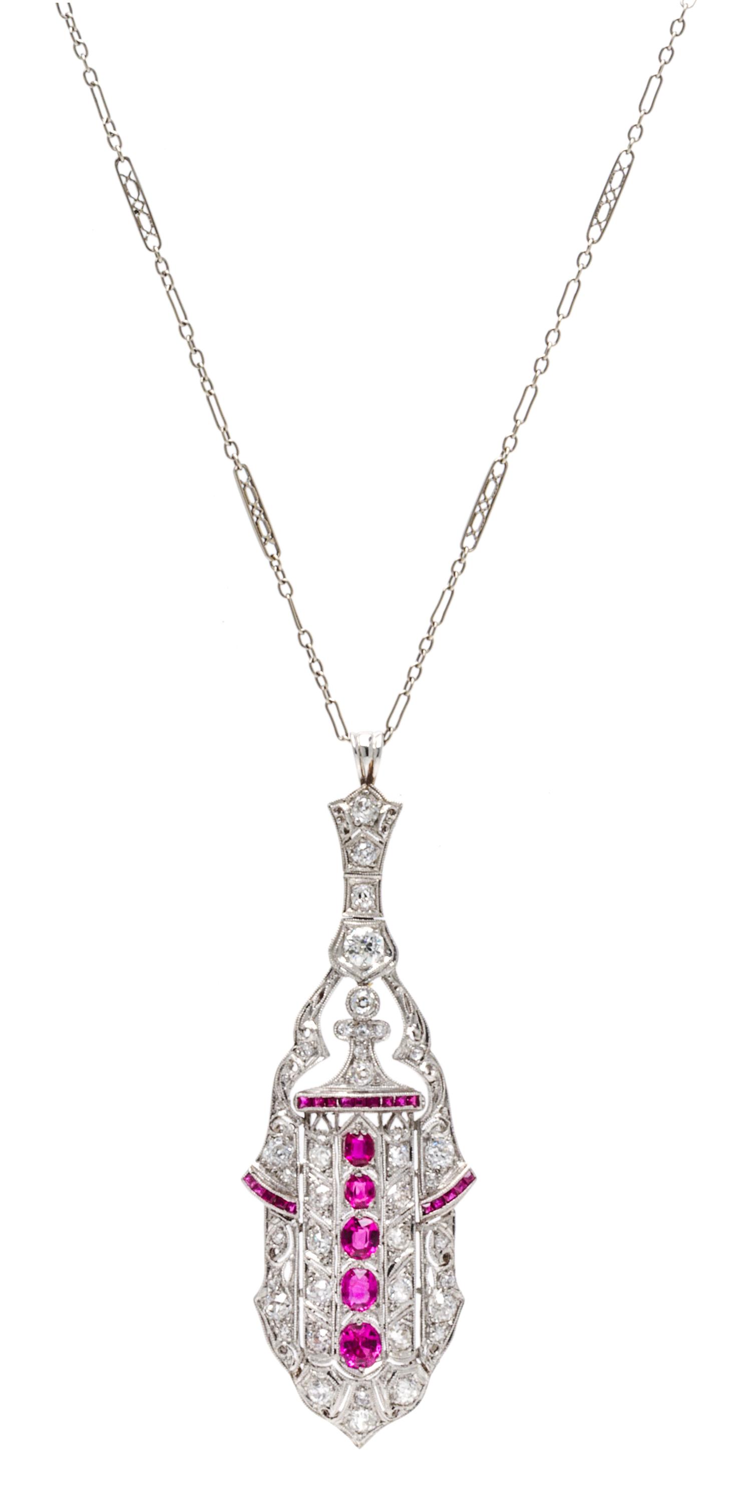 An Art Deco Platinum, Ruby and Diamond Pendant, 8.80 dwts.