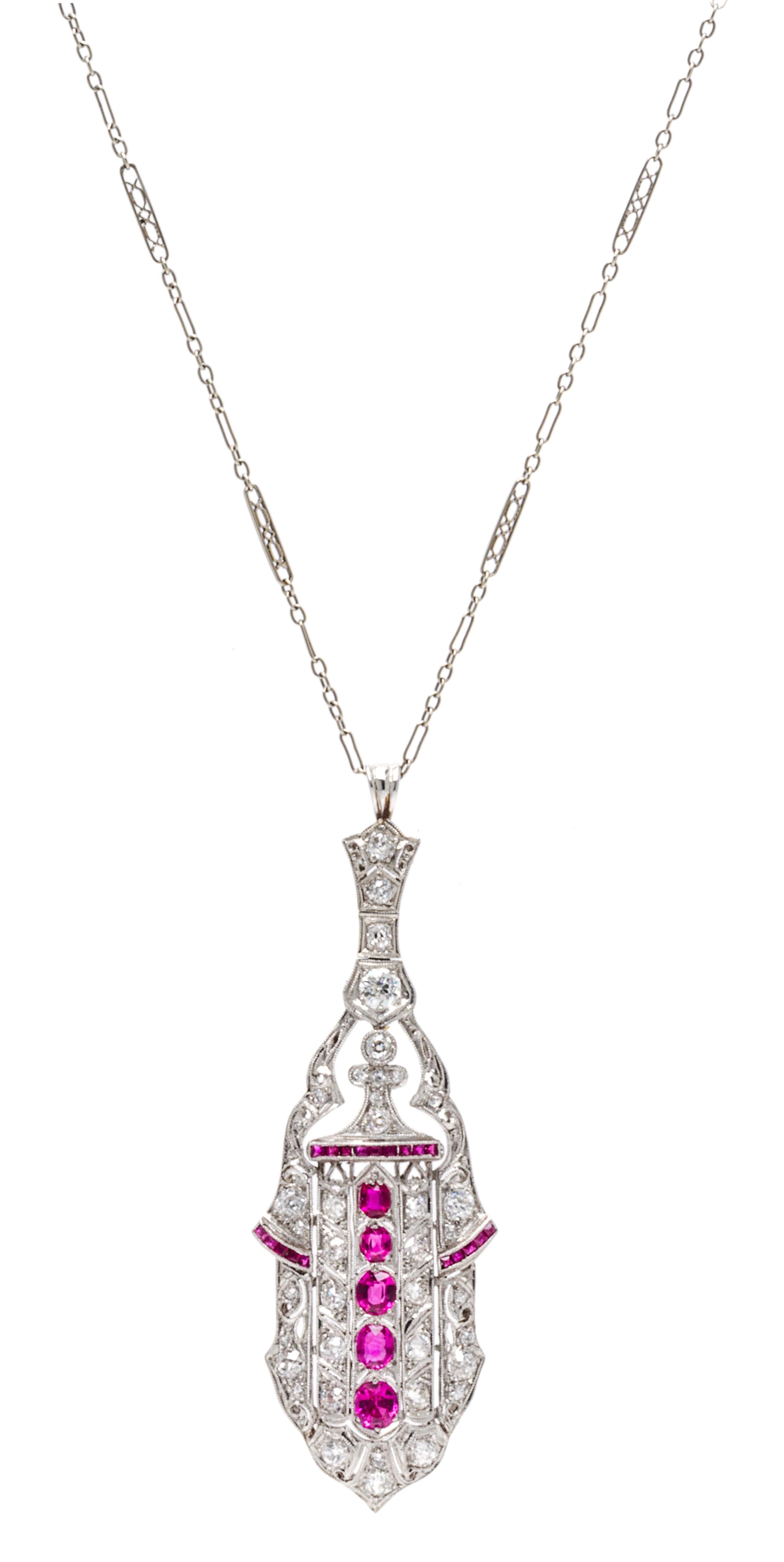 An Art Deco Platinum, Ruby and Diamond Pendant, 8.80 dwts.