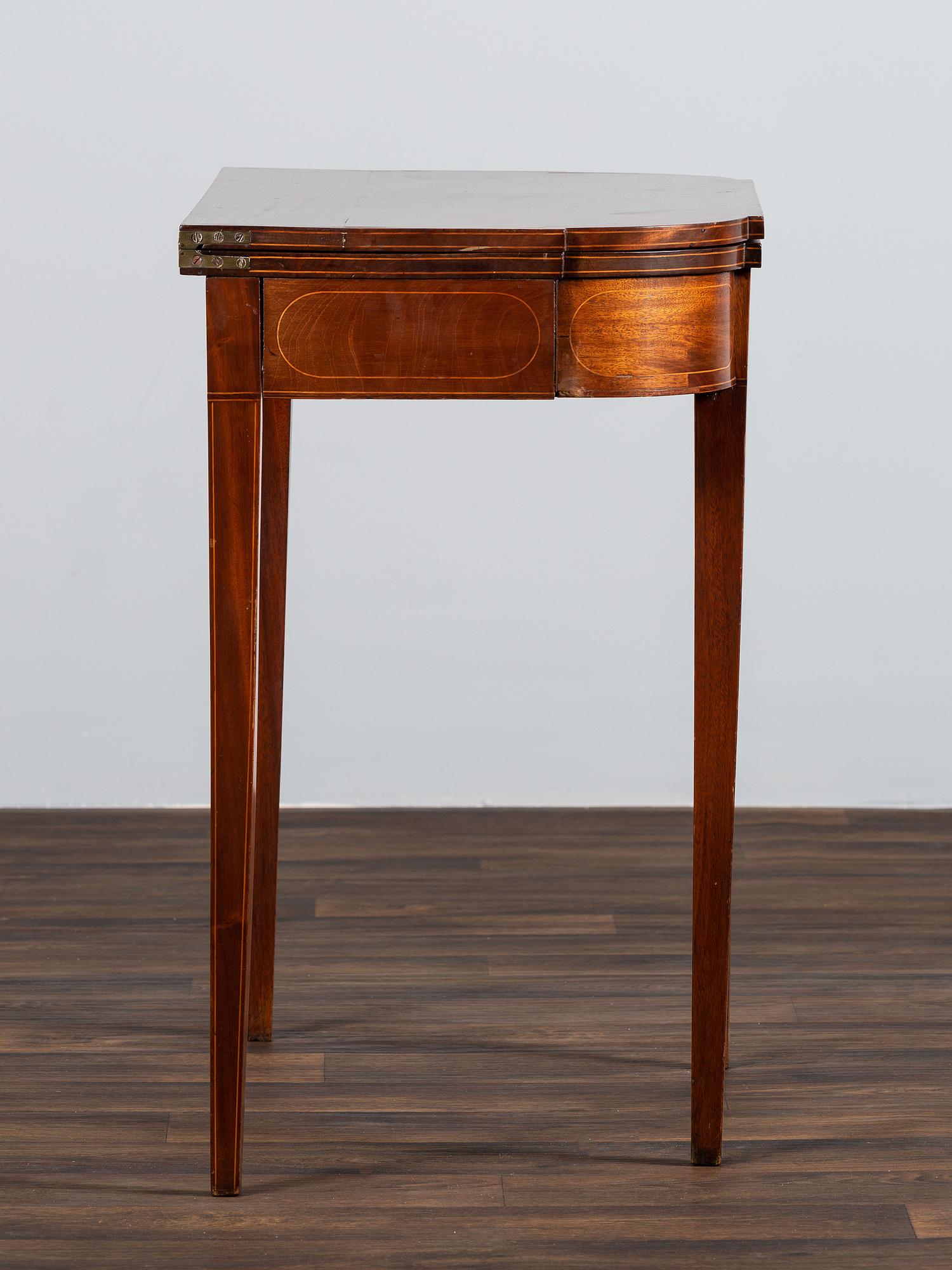 A Federal Figured and Floral Inlaid Mahogany Game Table