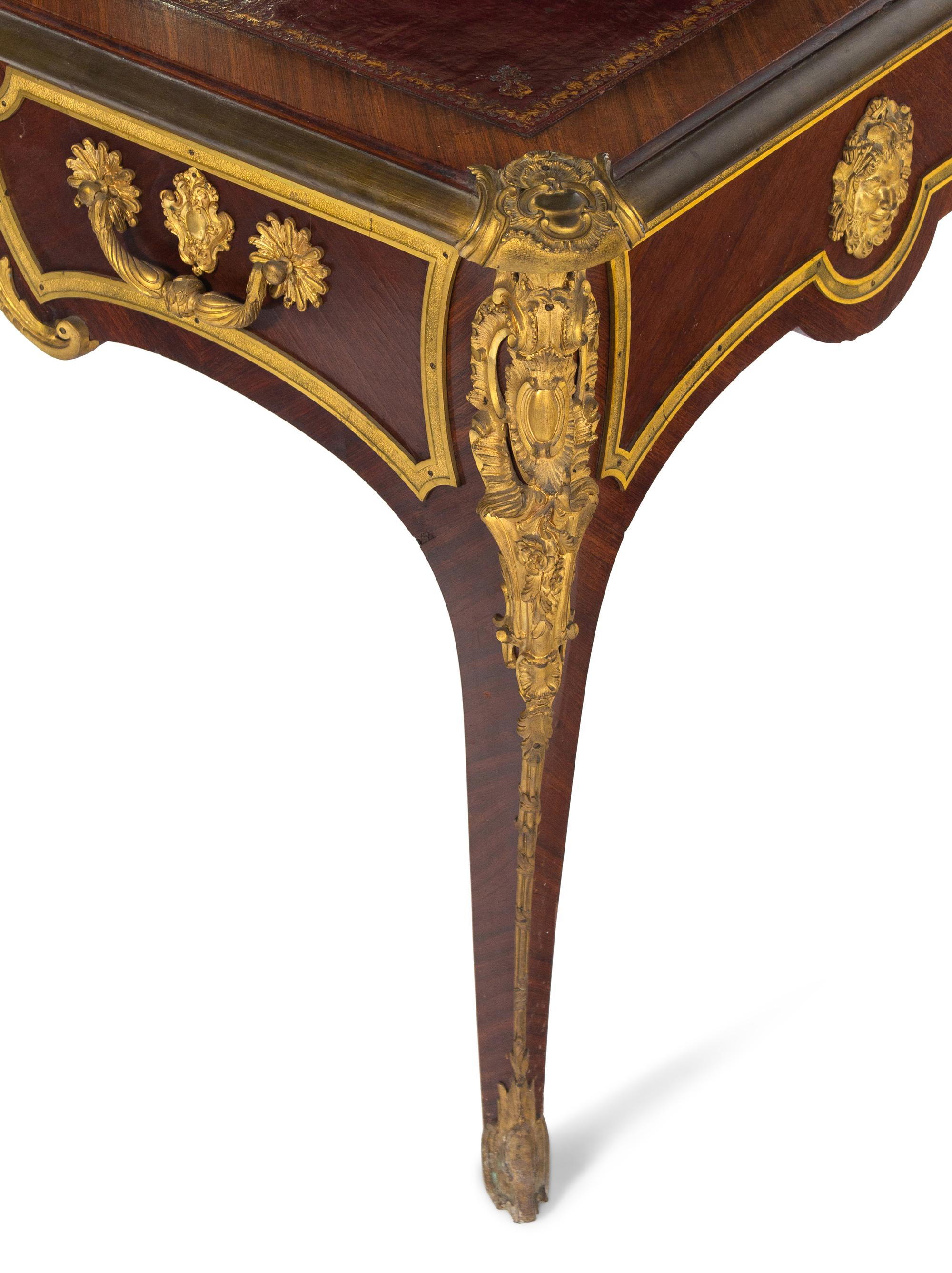 A Louis XV Style Gilt Bronze Mounted Kingwood Bureau Plat