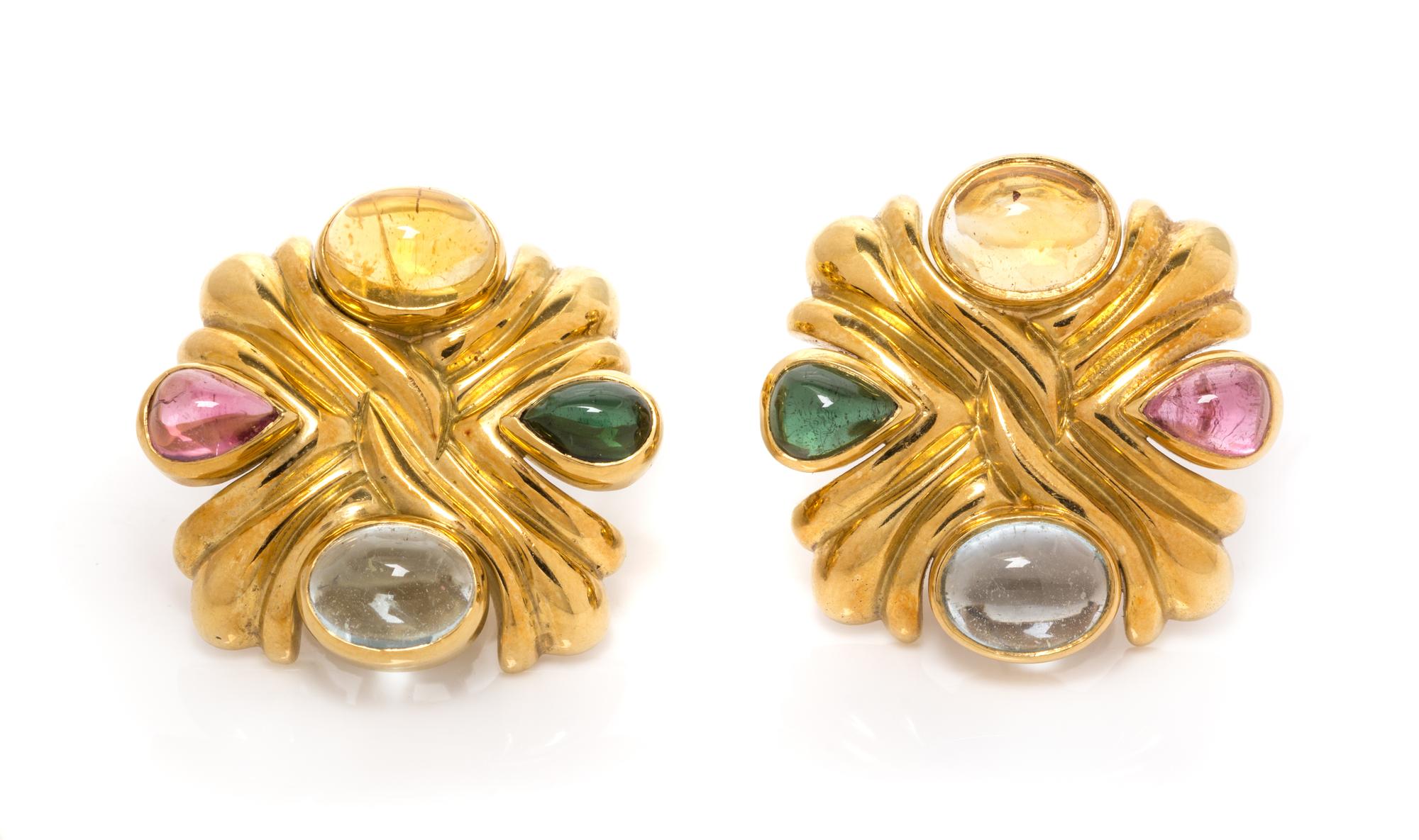 A Pair of 18 Karat Yellow Gold and Multigem Earclips, 18.45 dwts.
