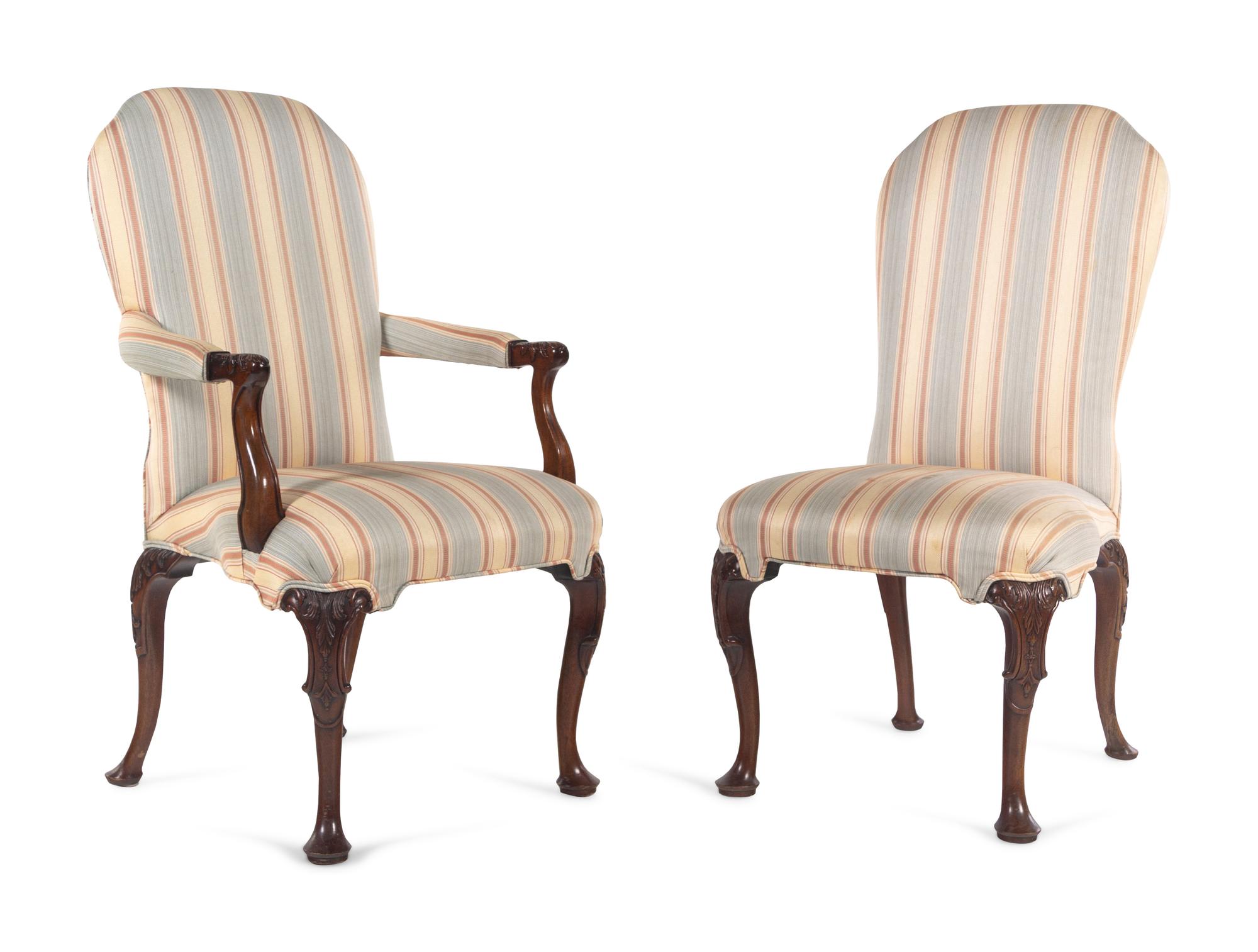 A Set of Four George II Style Carved Mahogany Dining Chairs