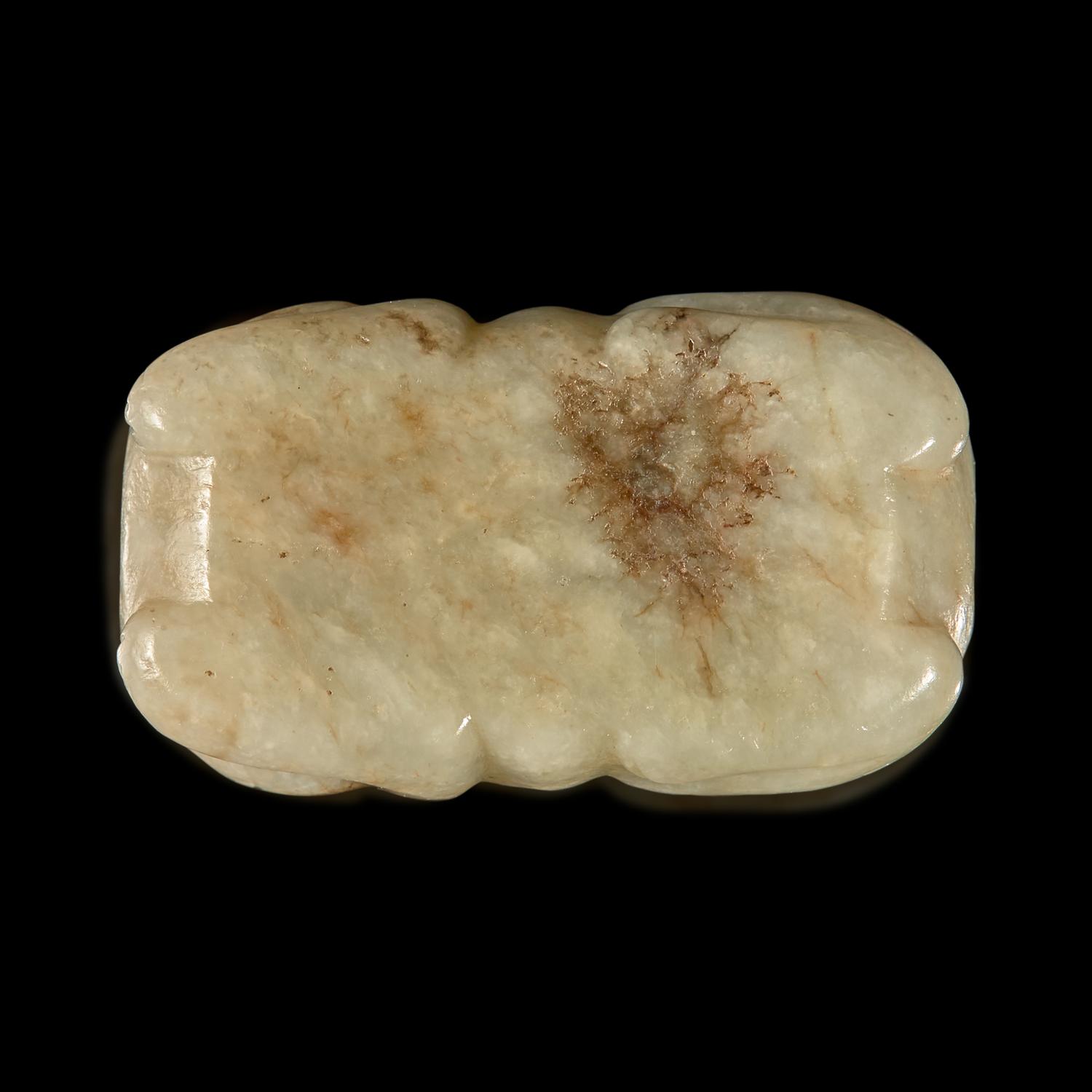 A Small Chinese Black and Celadon-Grey Jade Cat, Ming Dynasty 明 灰褐玉卧貓