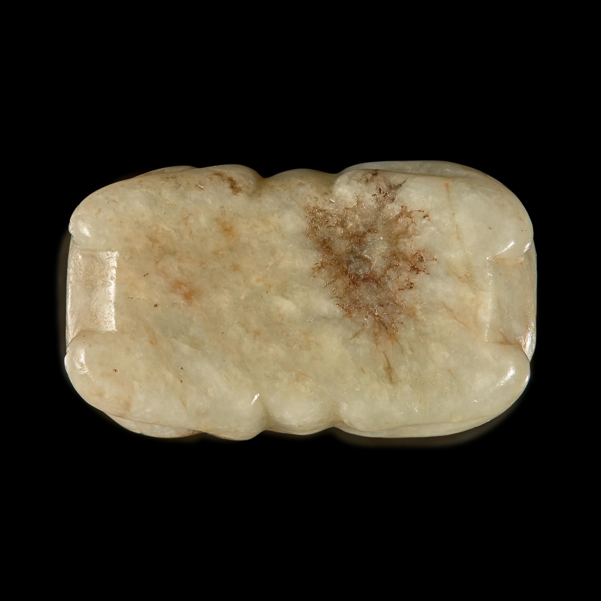 A Small Chinese Black and Celadon-Grey Jade Cat, Ming Dynasty 明 灰褐玉卧貓