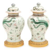 A Pair of Gilt Bronze Mounted Wucai Porcelain Baluster Jars and Covers