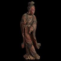 A Chinese carved and lacquered wood figure of Guanyin