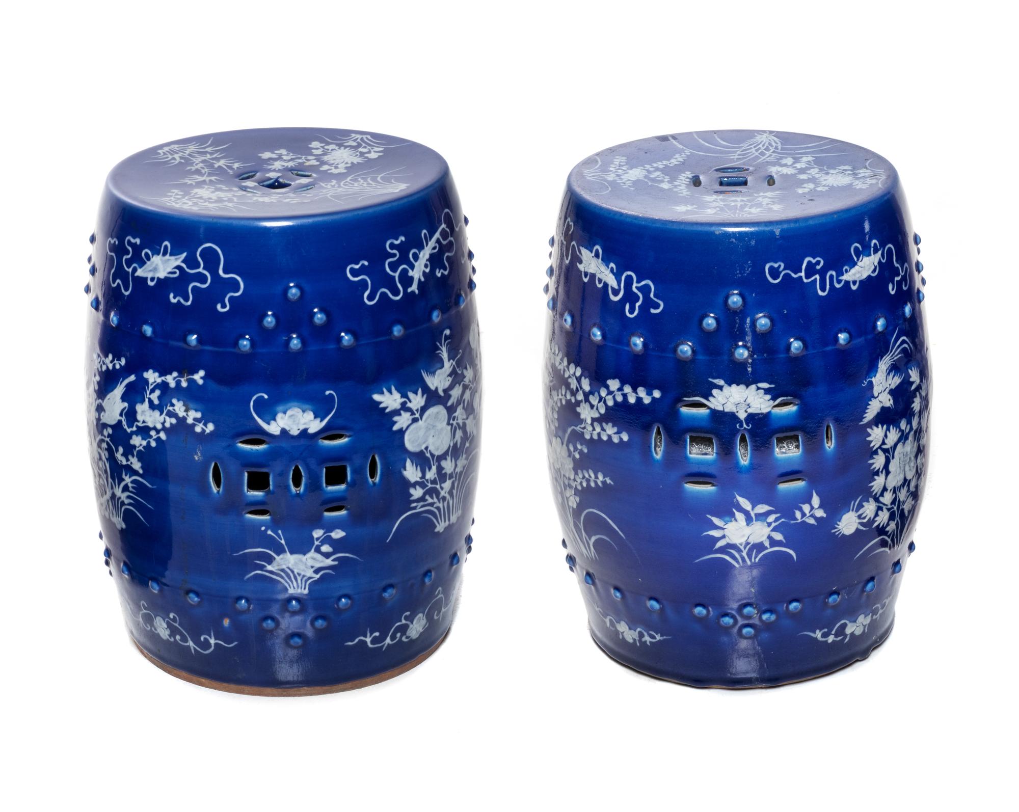 A Pair of Chinese Blue and White Porcelain Garden Stools Height 18 1/4 inches. — 20TH CENTURY