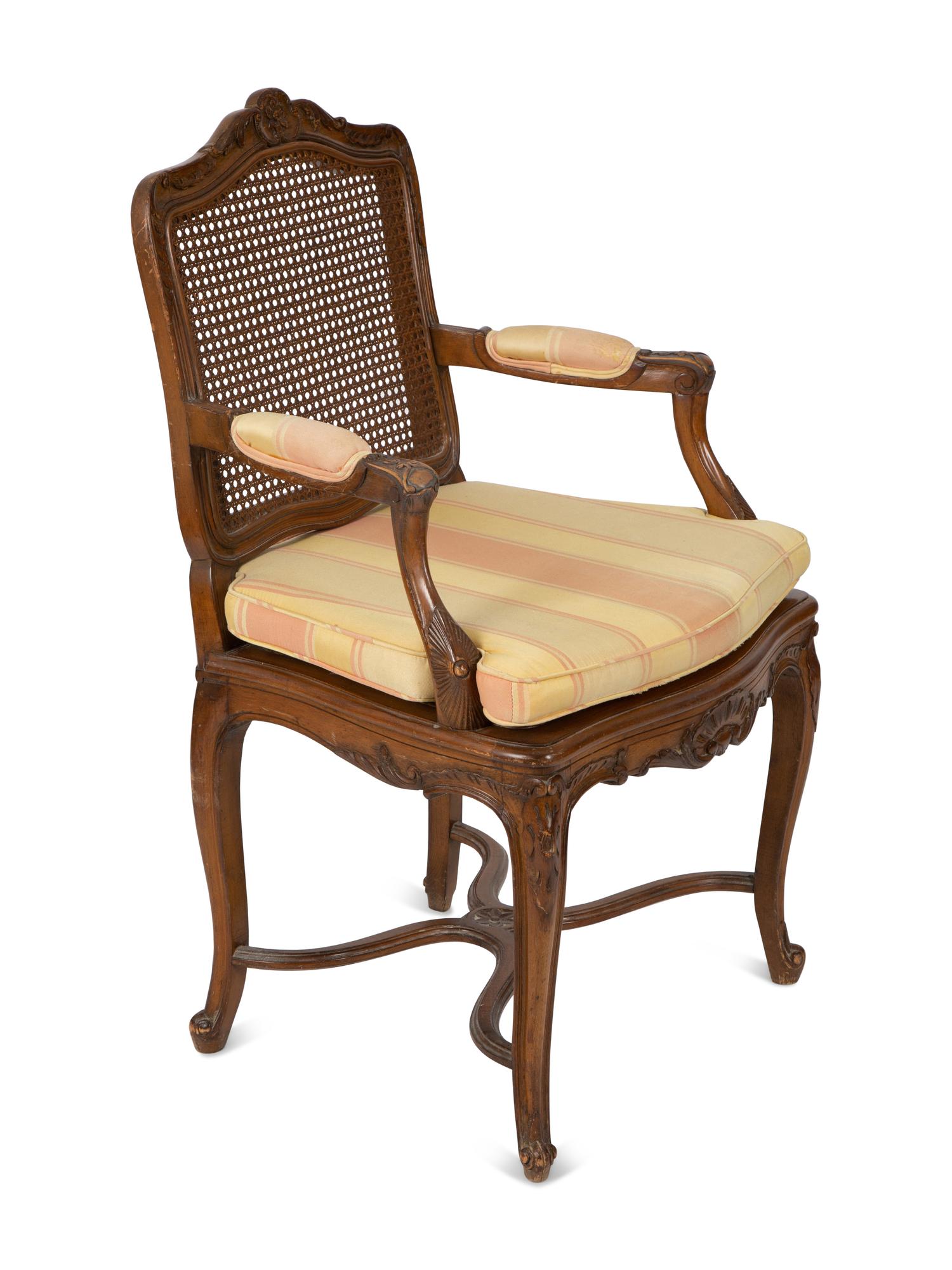 A Louis XV Style Carved Mahogany Cane Seat and Back Fauteuil — 20TH CENTURY