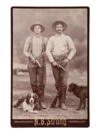 [EARLY PHOTO] Cabinet card of doubly-armed men with their dogs. [Eureka, CA]: N.B. Strong, ca 1880s.