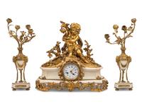 An Assembled French Gilt Bronze Mounted Marble Three-Piece Clock Garniture