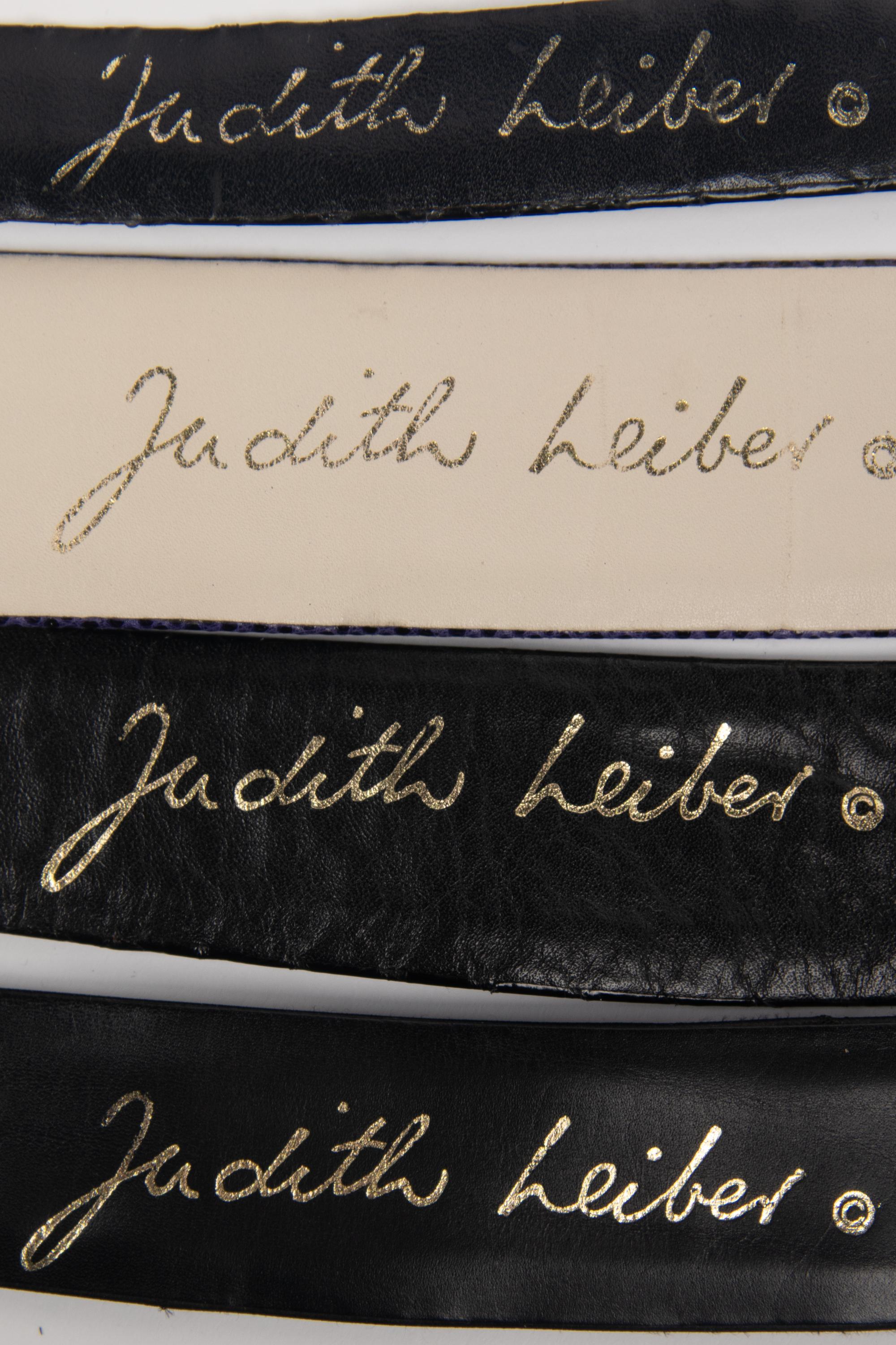 Six Judith Leiber Items: Snakeskin Bag, Metal Minaudière, and Four Belts