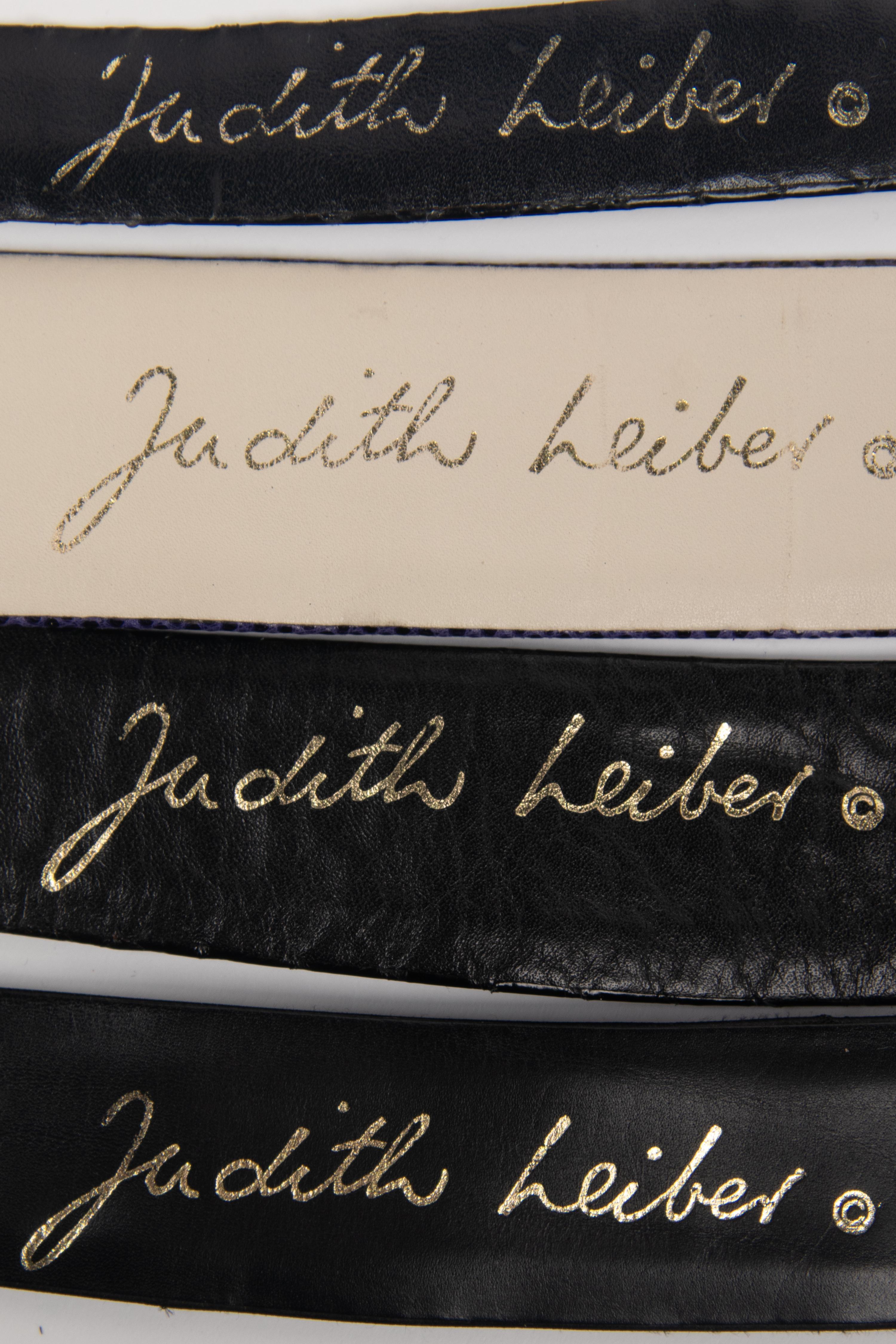 Six Judith Leiber Items: Snakeskin Bag, Metal Minaudière, and Four Belts