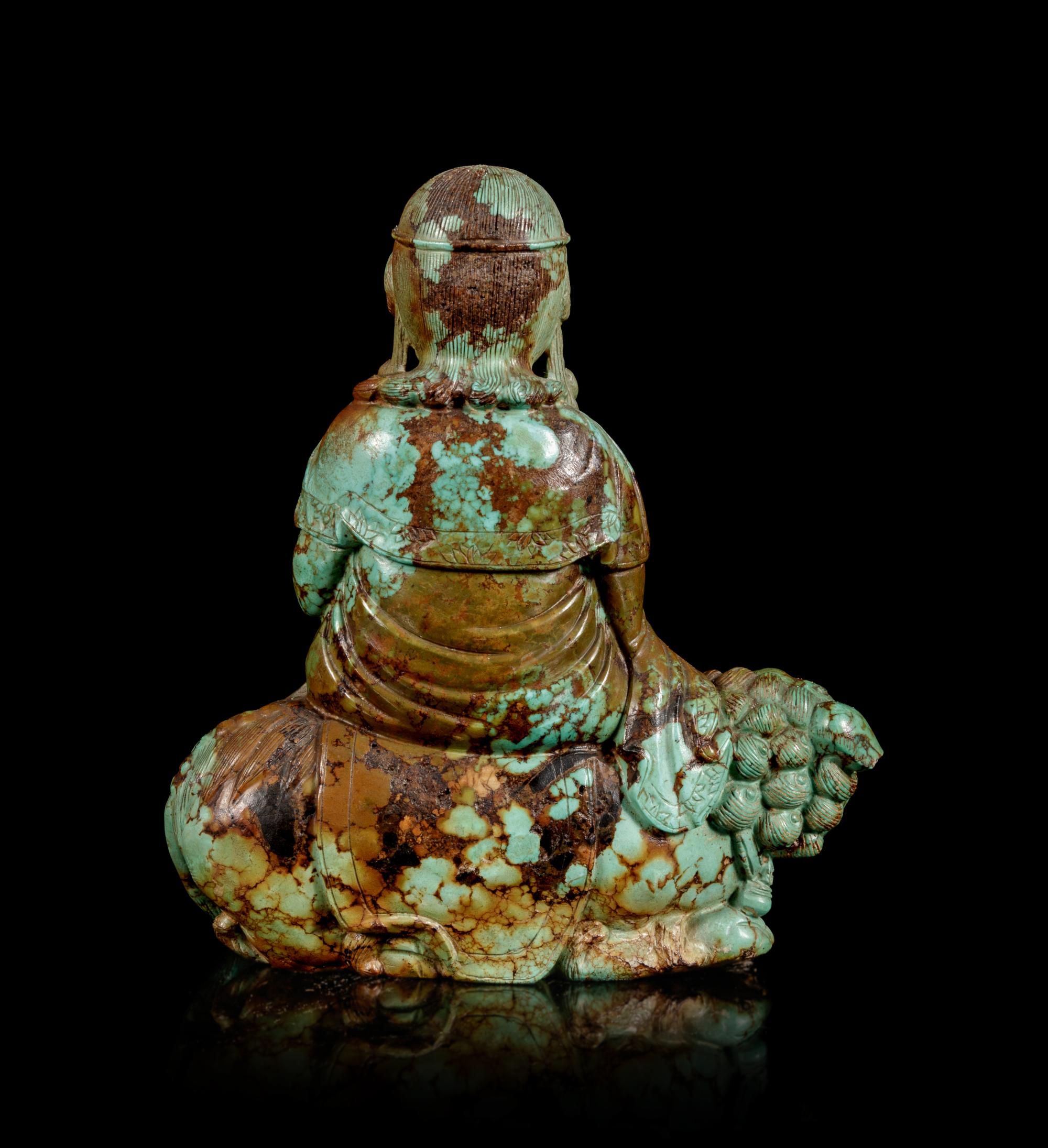 A Carved Turquoise Figure of Bodhisattva Manjushri