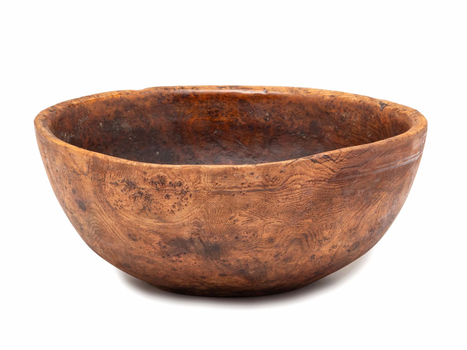 A Carved Burlwood Dough Bowl