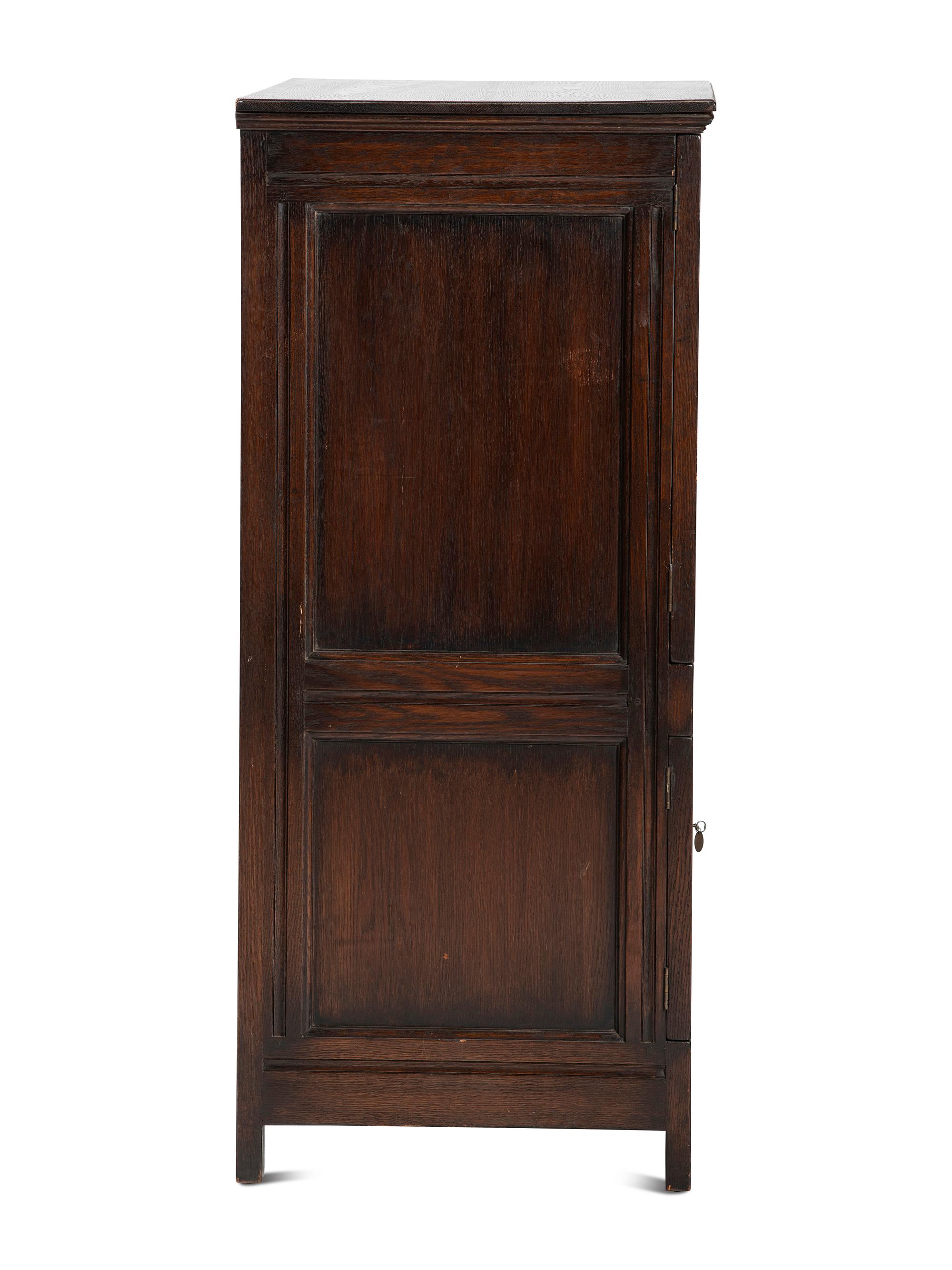 A Jacobean Style Carved Oak Cabinet