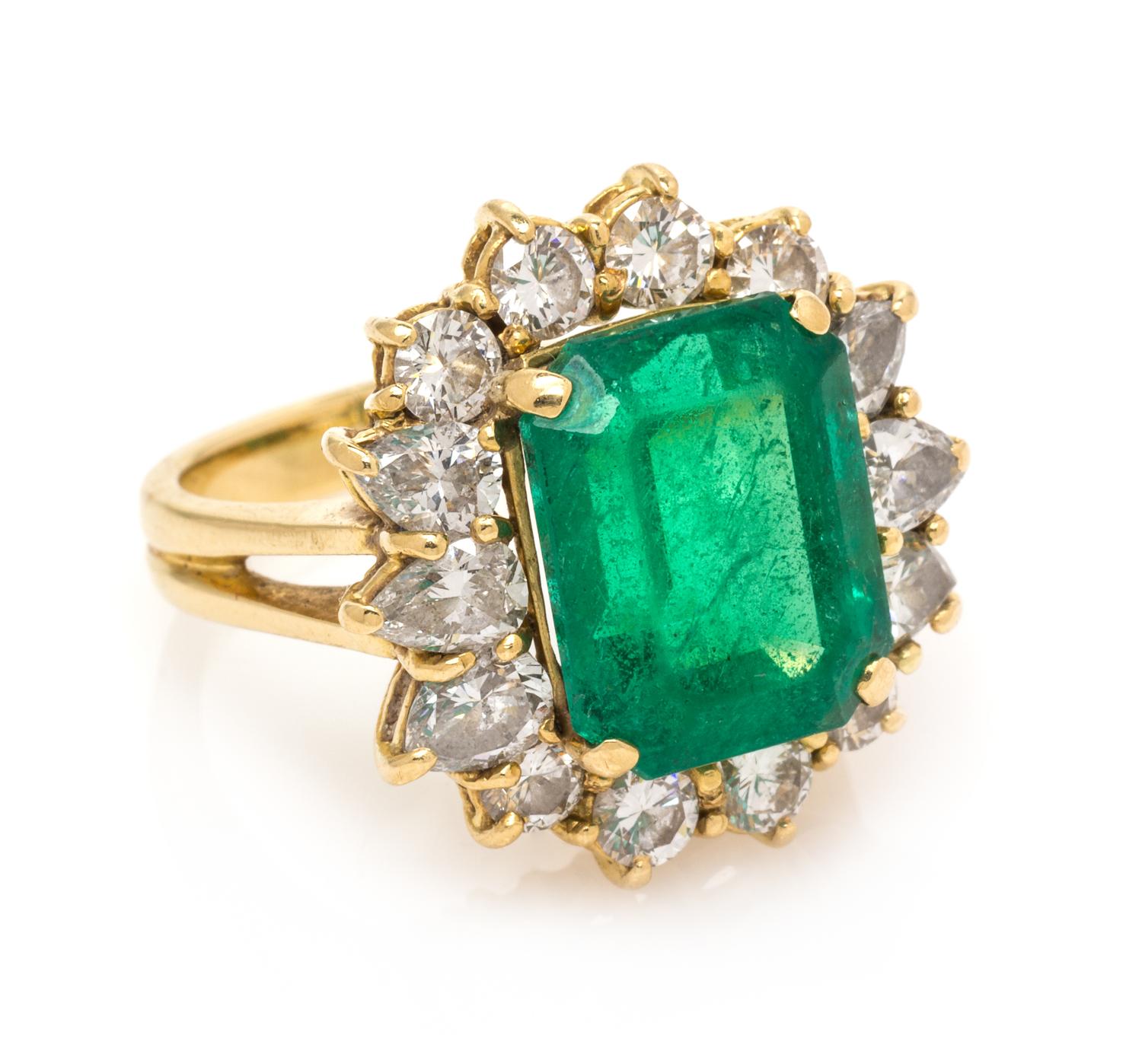 An 18 Karat Yellow Gold, Emerald and Diamond Ring, 7.60 dwts.