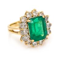 An 18 Karat Yellow Gold, Emerald and Diamond Ring, 7.60 dwts.