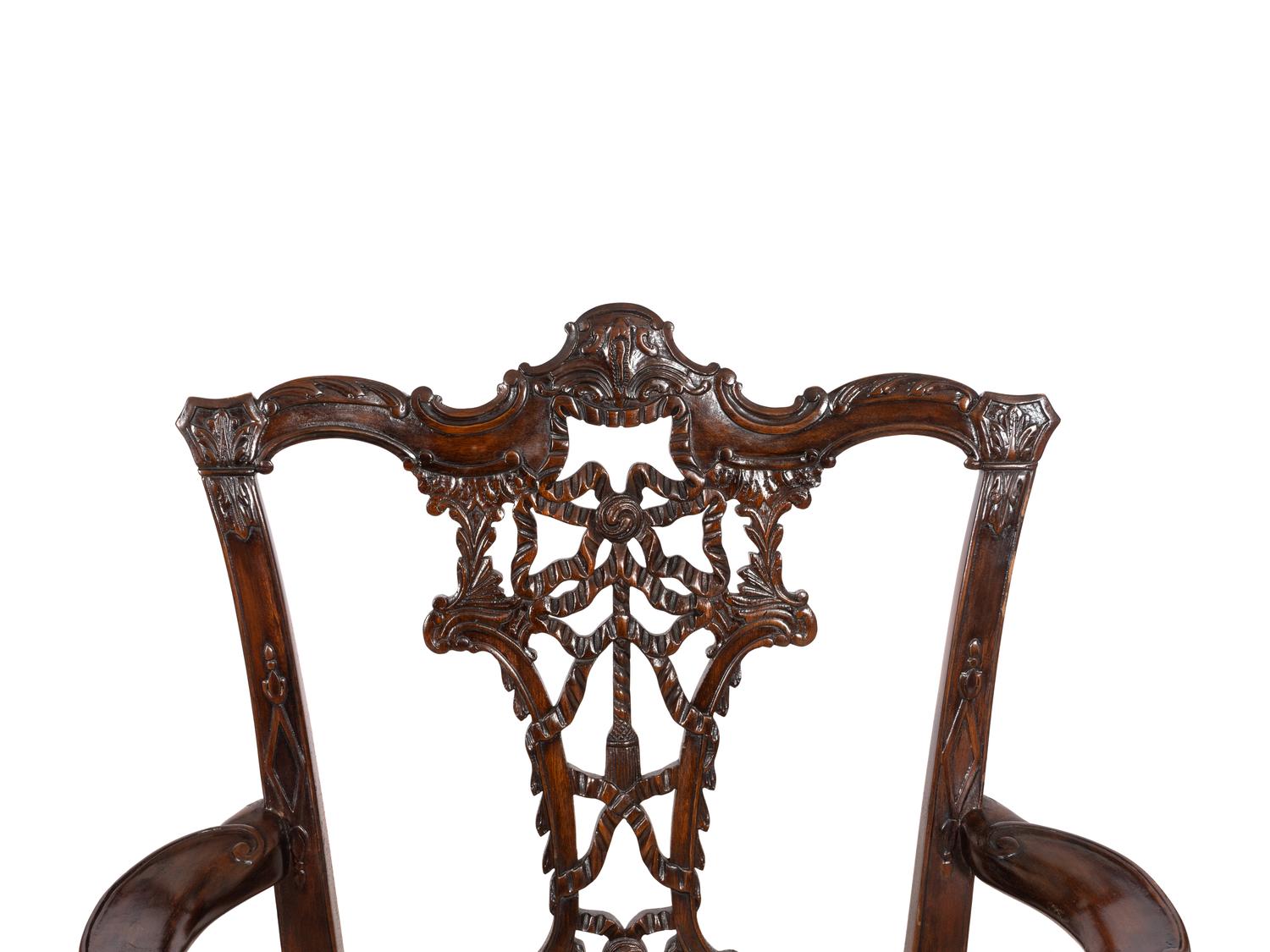 A Pair of George III Style Ribbon-Carved Mahogany Armchairs