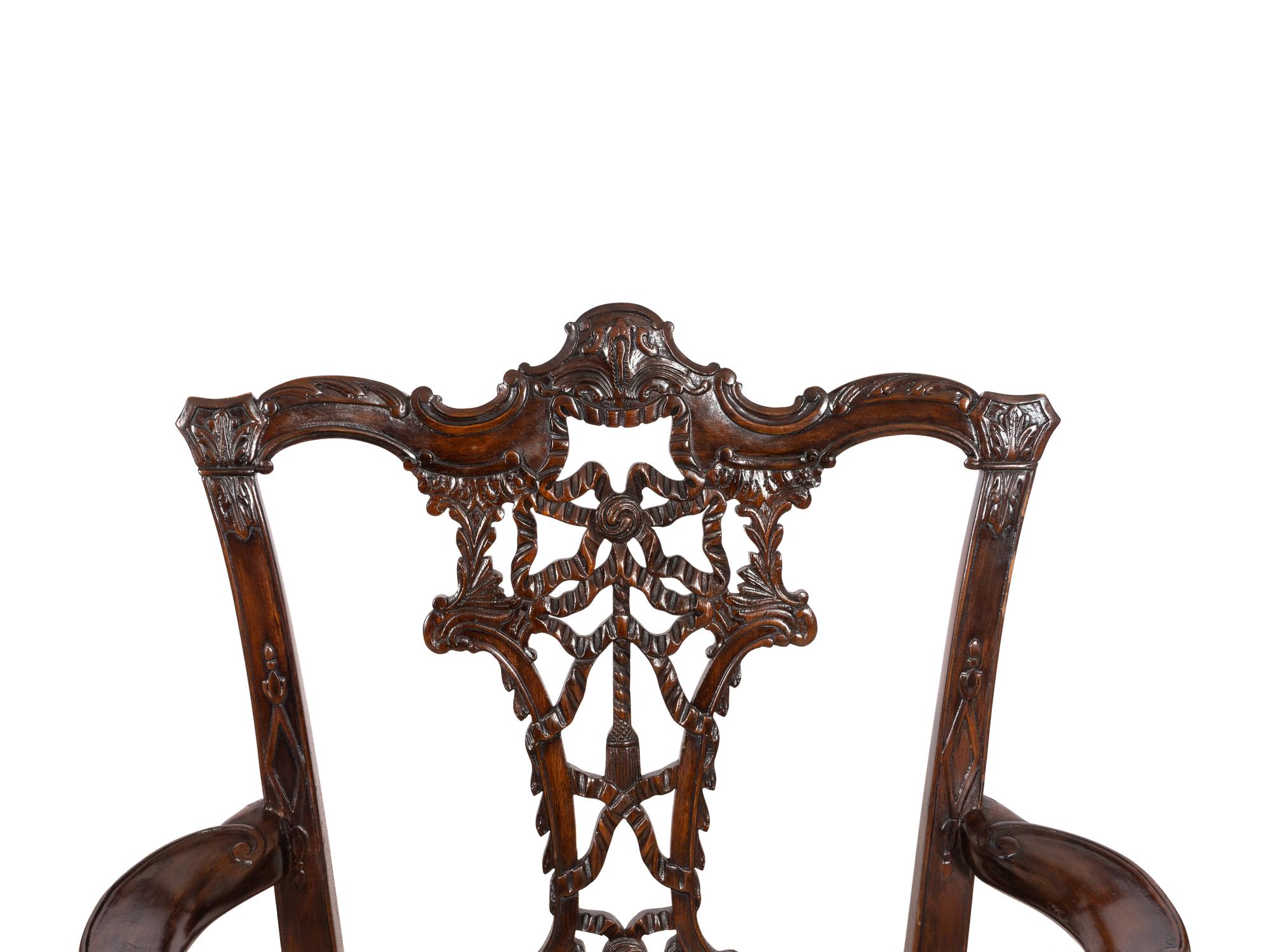 A Pair of George III Style Ribbon-Carved Mahogany Armchairs