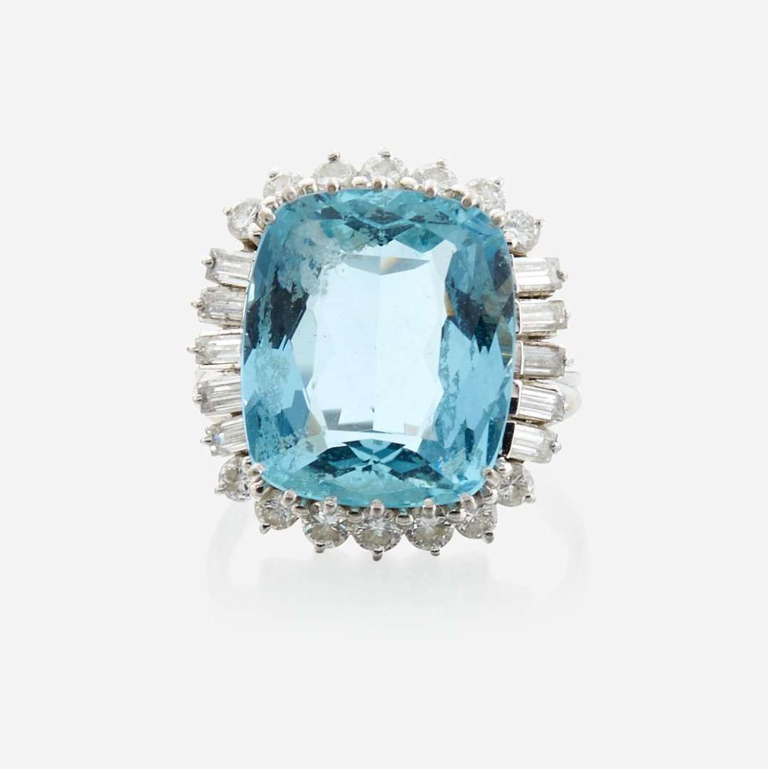 An aquamarine, diamond, and white gold ring