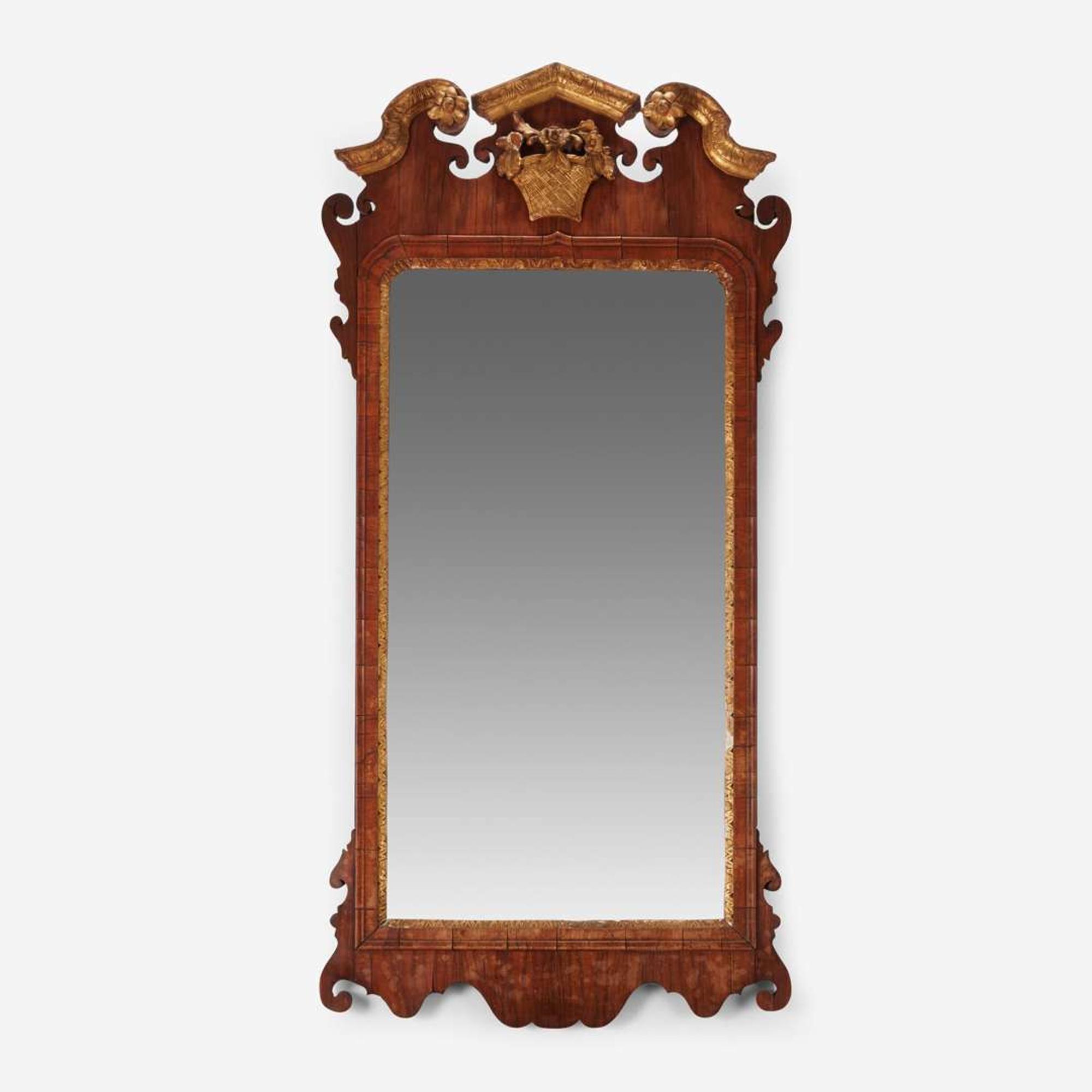 A Chippendale fret-carved mahogany and parcel-gilt looking glass second half 18th century