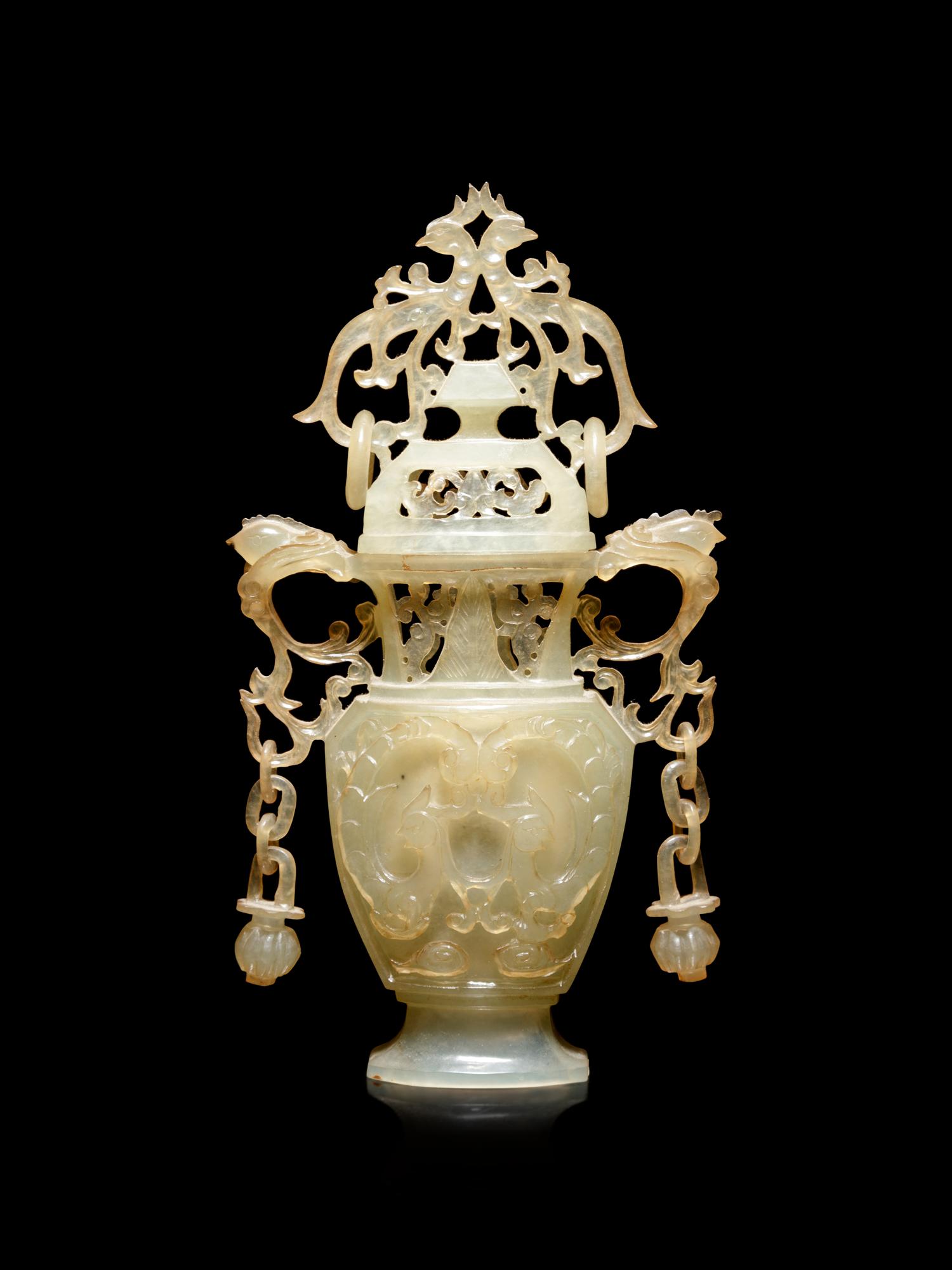 A Carved Serpentine Vase and Cover