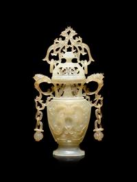 A Carved Serpentine Vase and Cover