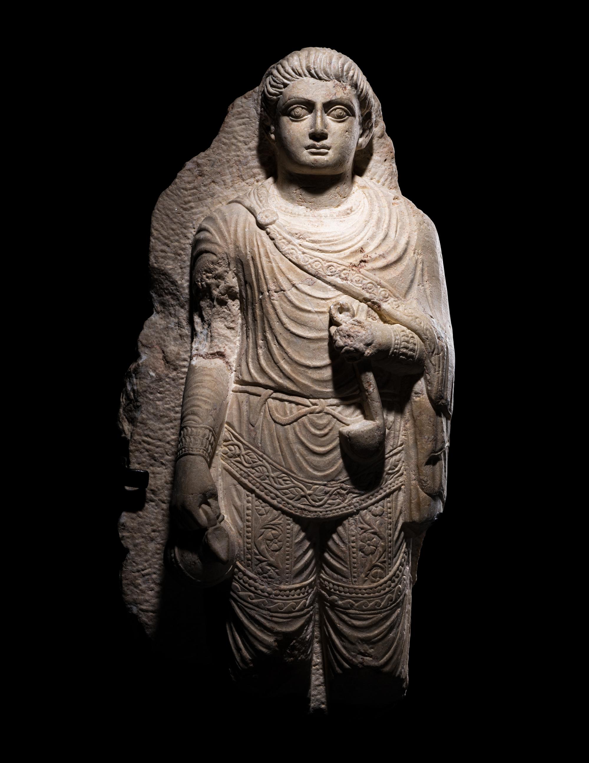 A Palmyrene Limestone Relief Fragment of a Youth