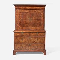 A William & Mary oyster veneered walnut secretary bookcase circa 1700