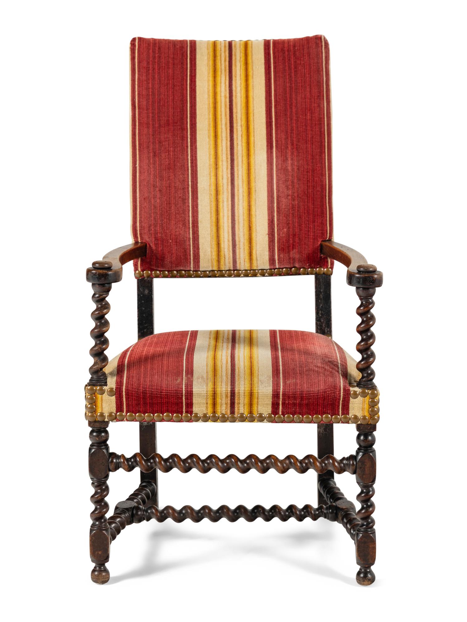 A William and Mary Style Carved Walnut Armchair