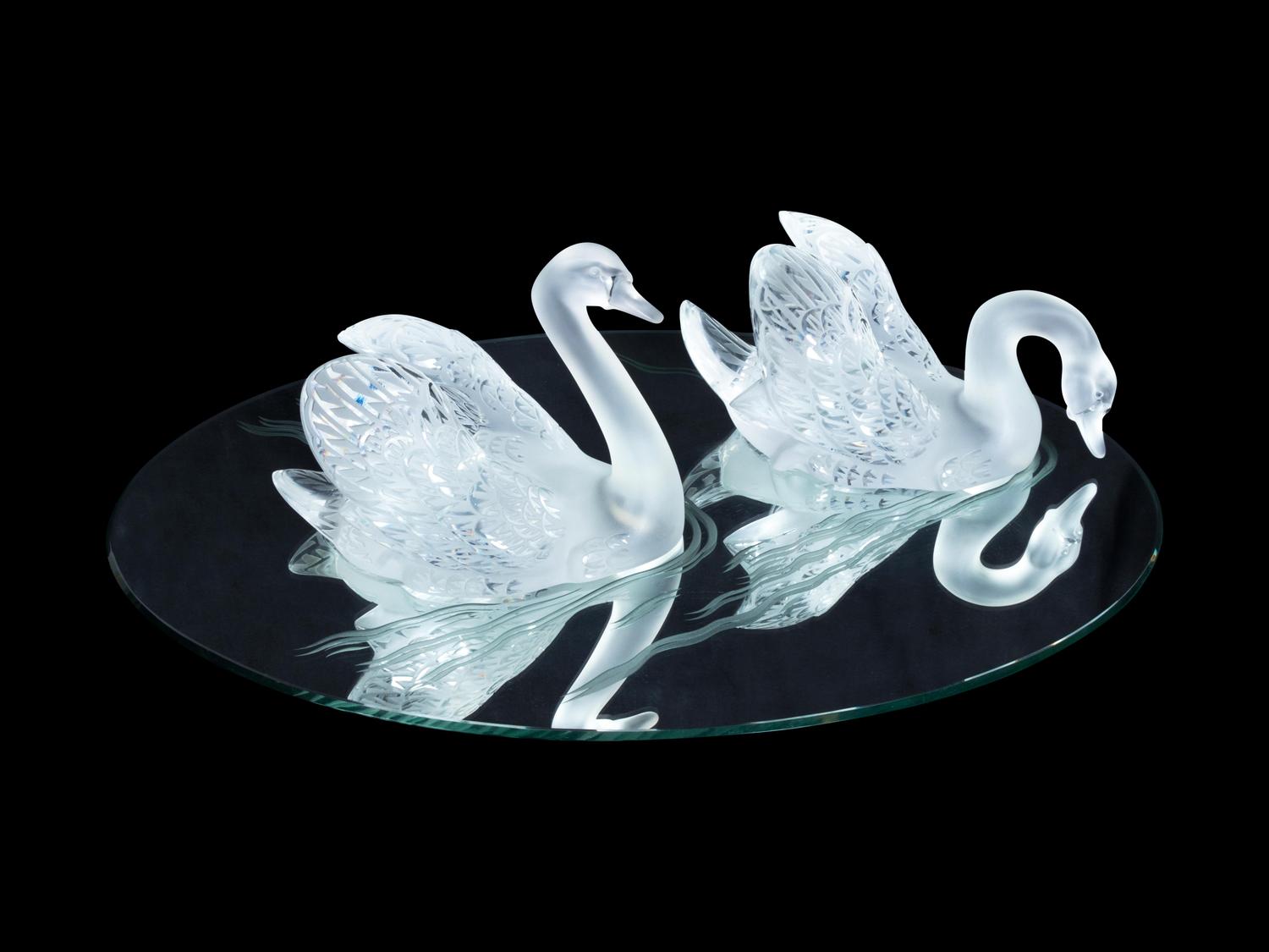 A Pair of Lalique Miroir Cygnes Swan Ornaments with Mirrored Plateau