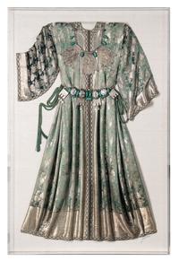 A Middle Eastern Metal and Stone-Embellished Dress in an Acrylic Frame