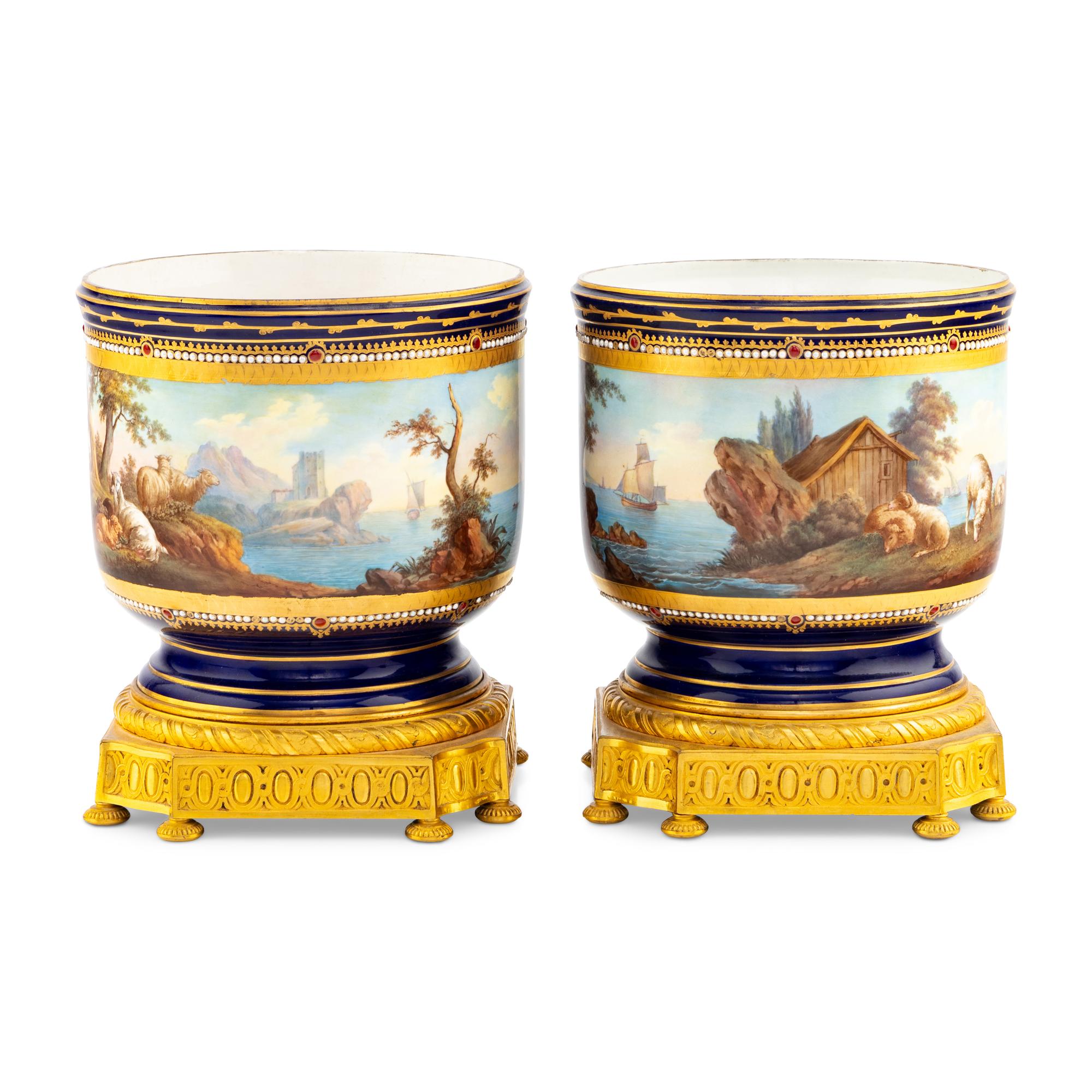 A Pair of Sèvres Style Gilt Bronze Mounted Porcelain Cache Pots