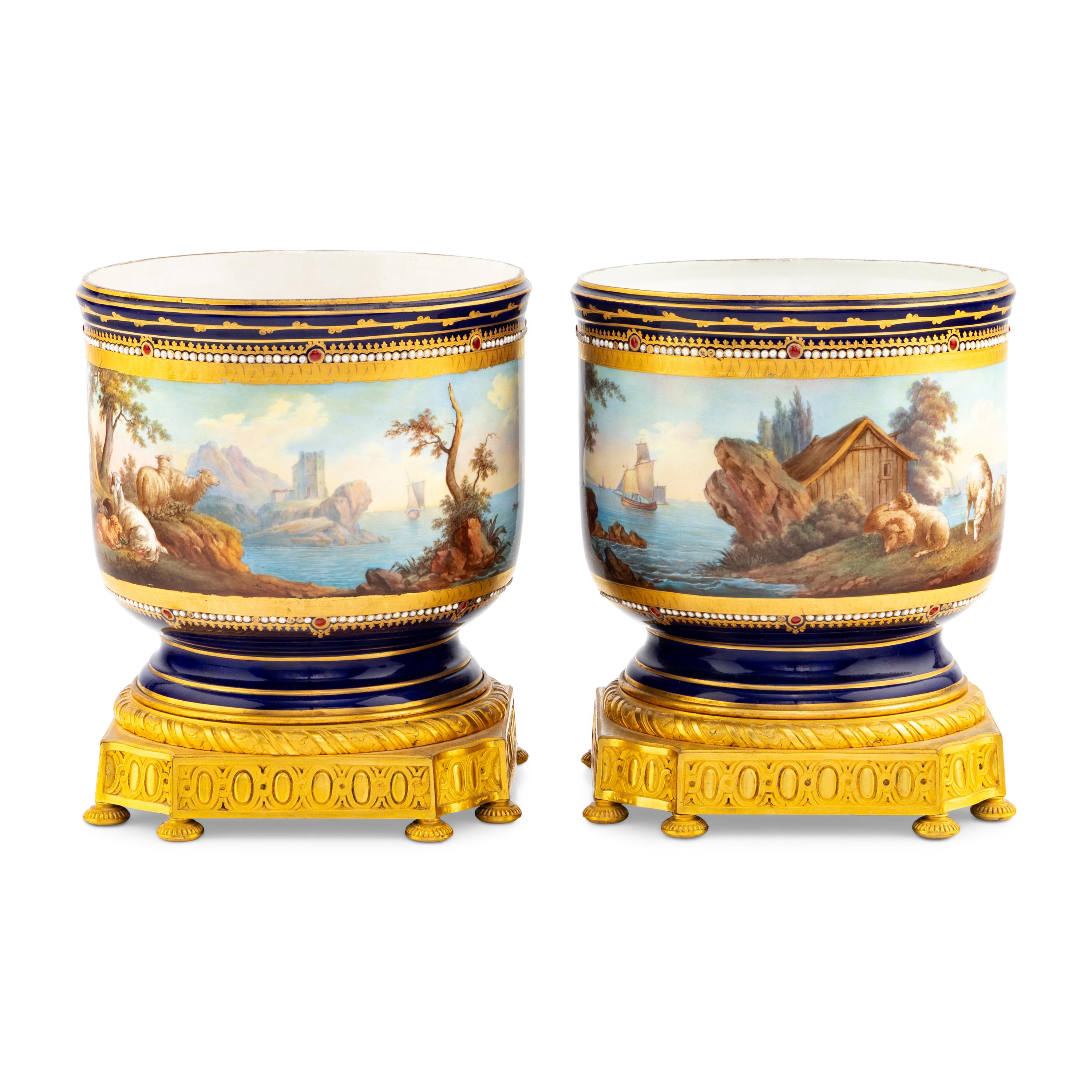 A Pair of Sèvres Style Gilt Bronze Mounted Porcelain Cache Pots