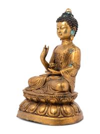 A Gilt Bronze Seated Buddha Figure on Lotus Flower Base