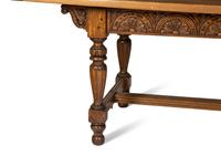 An Arts & Crafts Style Carved Oak Refectory Table