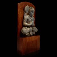 A carved schist figure of the seated Teaching Buddha, Ancient region of Gandhara, 2nd-3rd century 灰片岩雕像坐像 古犍陀羅地區，二至三世紀