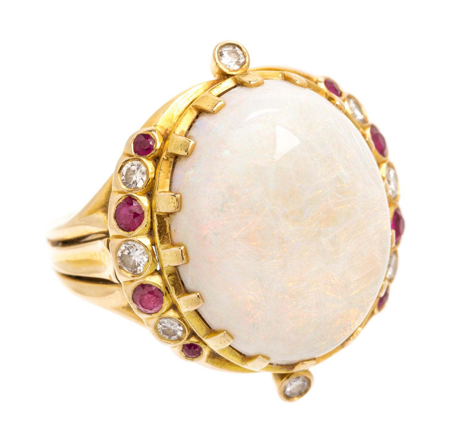An 18 Karat Yellow Gold, Opal, Diamond and Ruby Ring, 6.90 dwts.