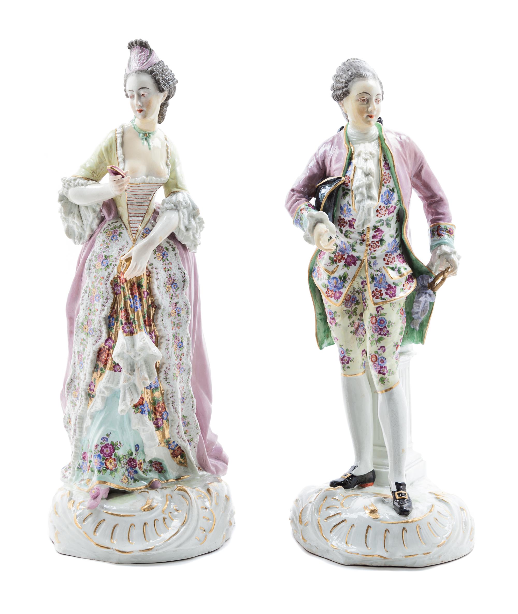 A Pair of Continental Porcelain Figures Height 17 1/2 inches. — 19TH/20TH CENTURY