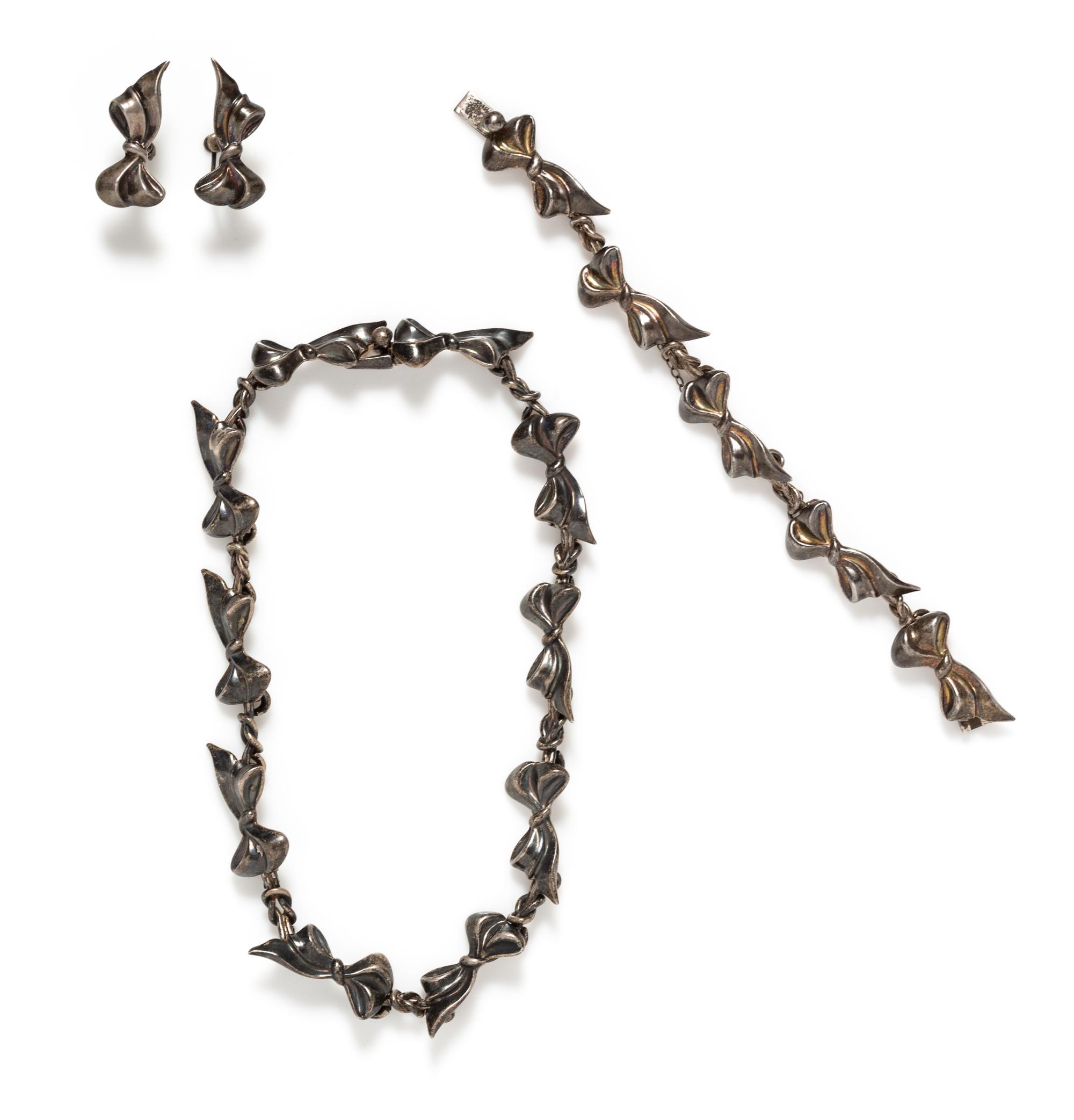A Sterling Silver Bow Motif Demi-Parure, Margot de Taxco, Circa 1950, 60.30 dwts.