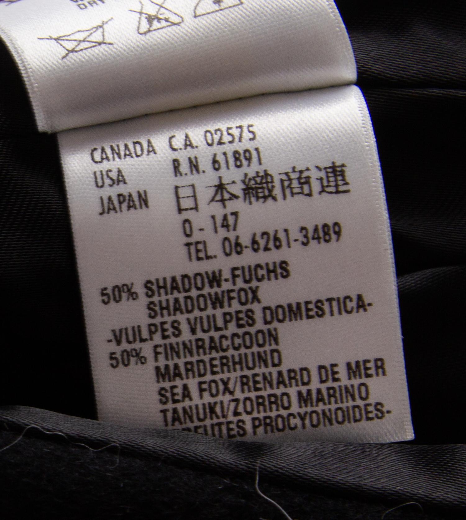 An Escada Black Wool Fox Trim Coat, Size 36.