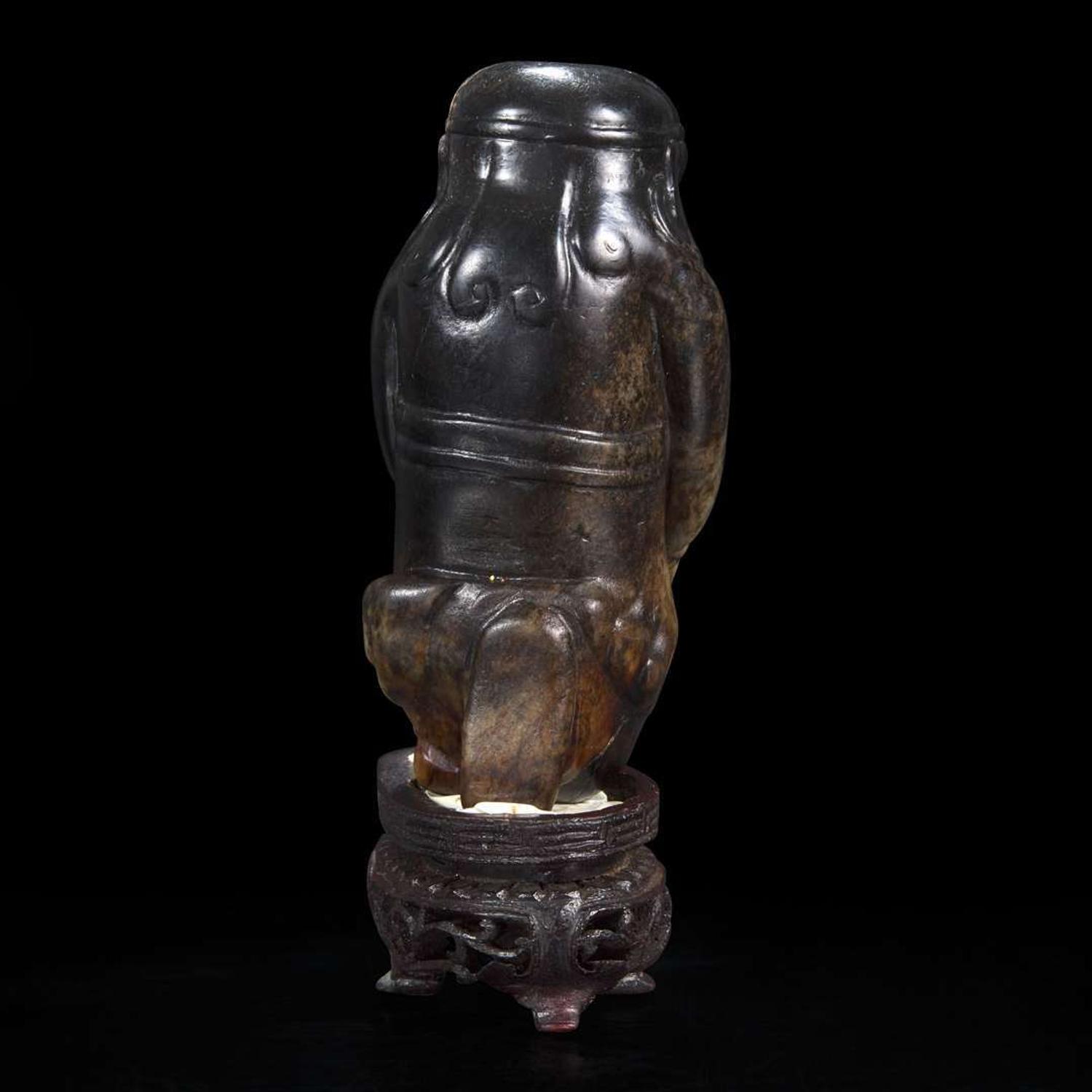 An unusual Chinese dark brown-black jade carving of a Lohan 笑狮罗汉玉雕 Ming dynasty or earlier ????