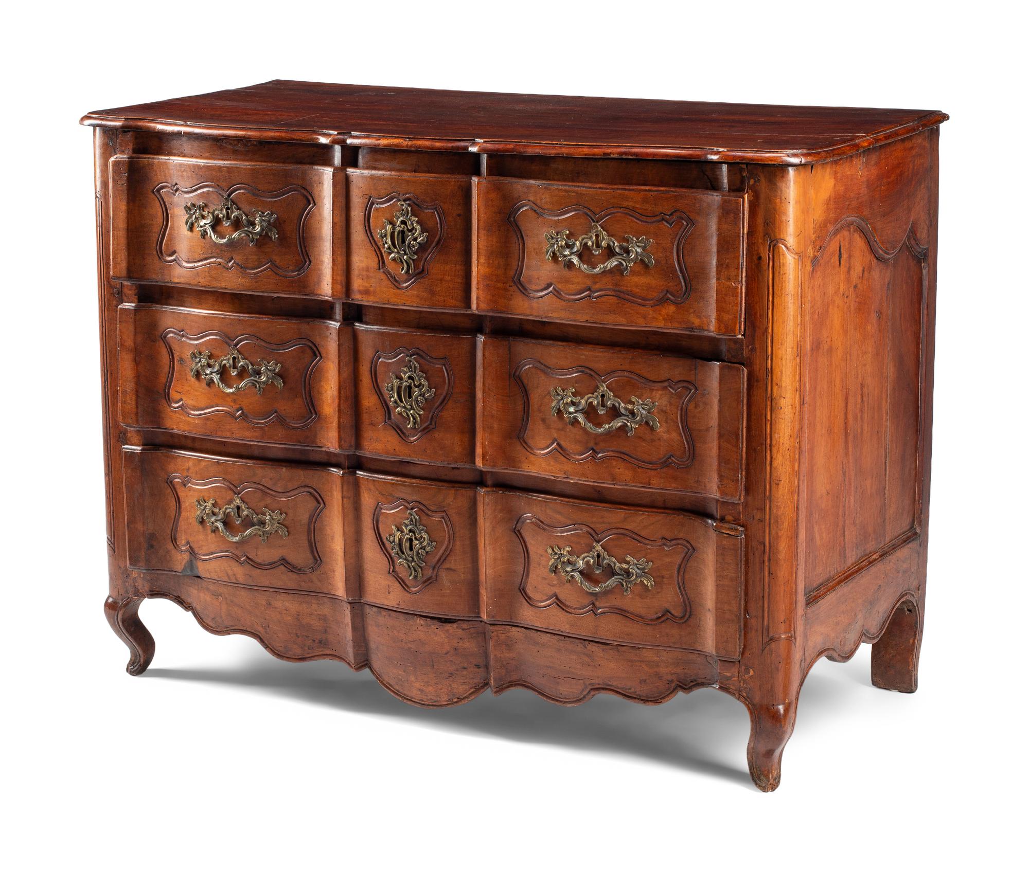 A Louis XV Provincial Walnut Commode